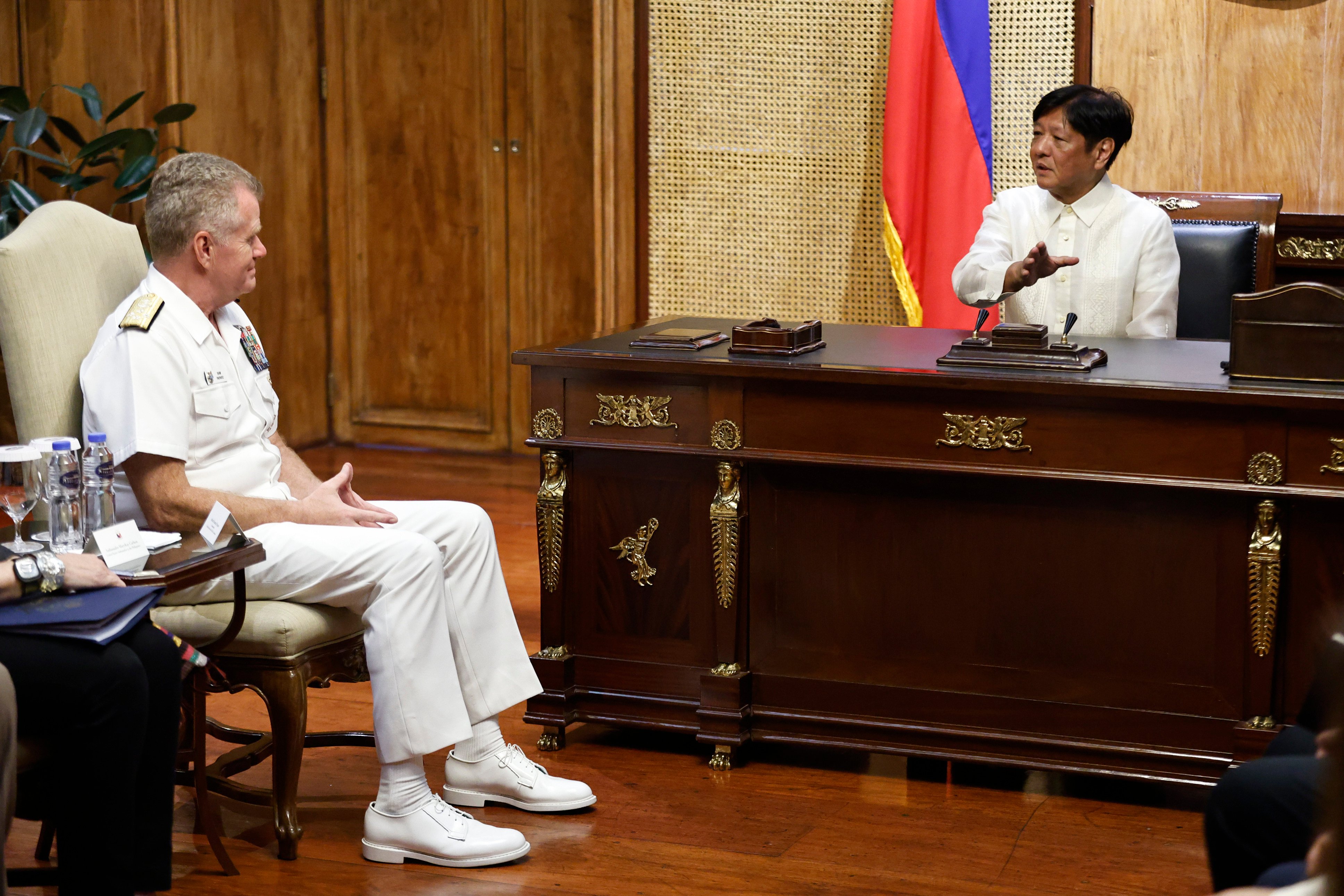 Philippine President Ferdinand Marcos Jnr talks to US Indo-Pacific commander Admiral Samuel Paparo during a courtesy visit, at the Malacanang presidential palace in Manila on August 27. Photo: AP