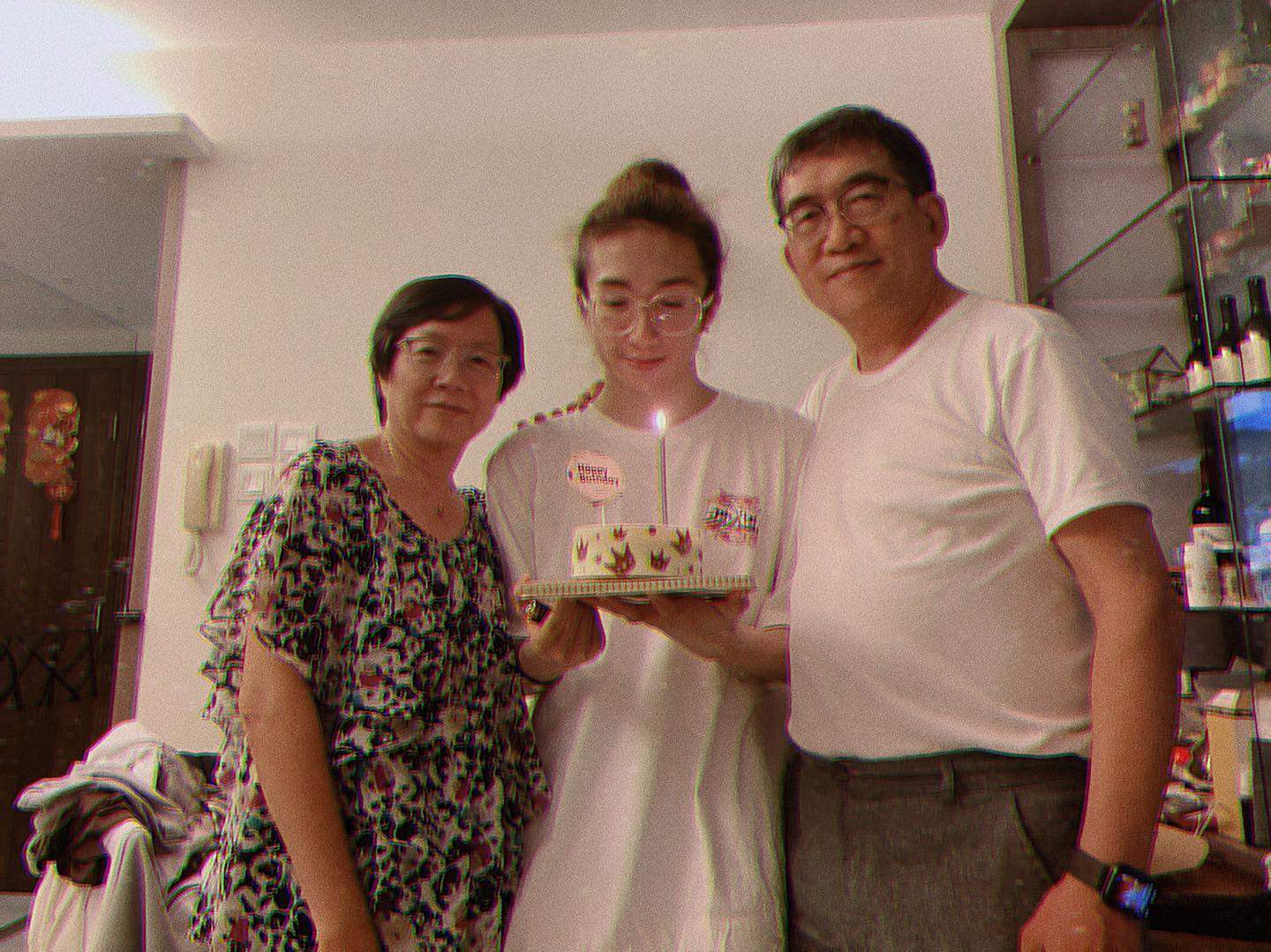 Mo Li (centre) with his parents. A four-by-four-metre LED screen struck the dancer during a concert. Photo: Instagram/Mo Lee Kai-yin