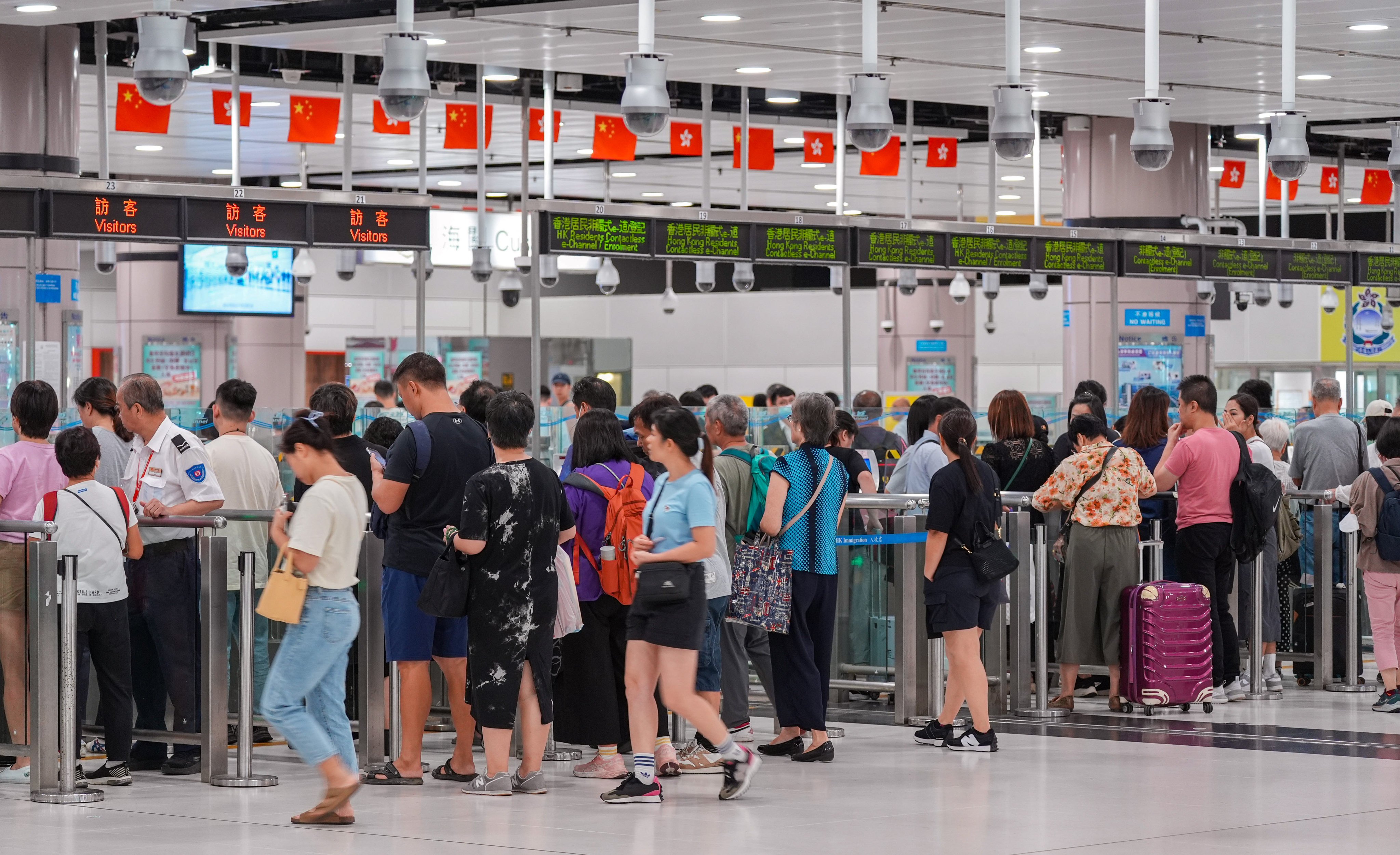 The permit allows for self-service clearance at border control checkpoints. Photo: Eugene Lee