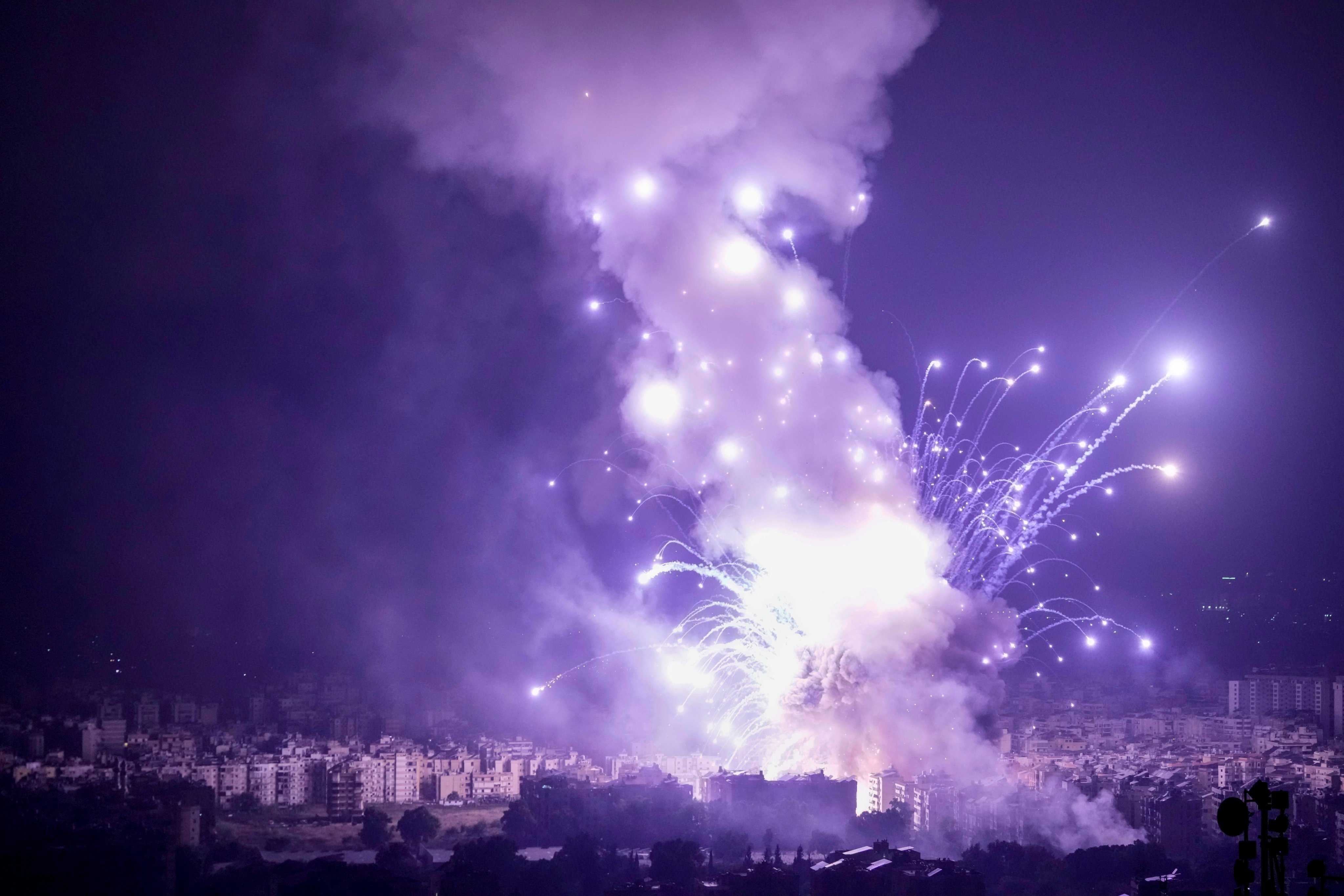 Flames and smoke rise from an Israeli air strike in Dahiyeh, Beirut, Lebanon, on Sunday. Photo: AP