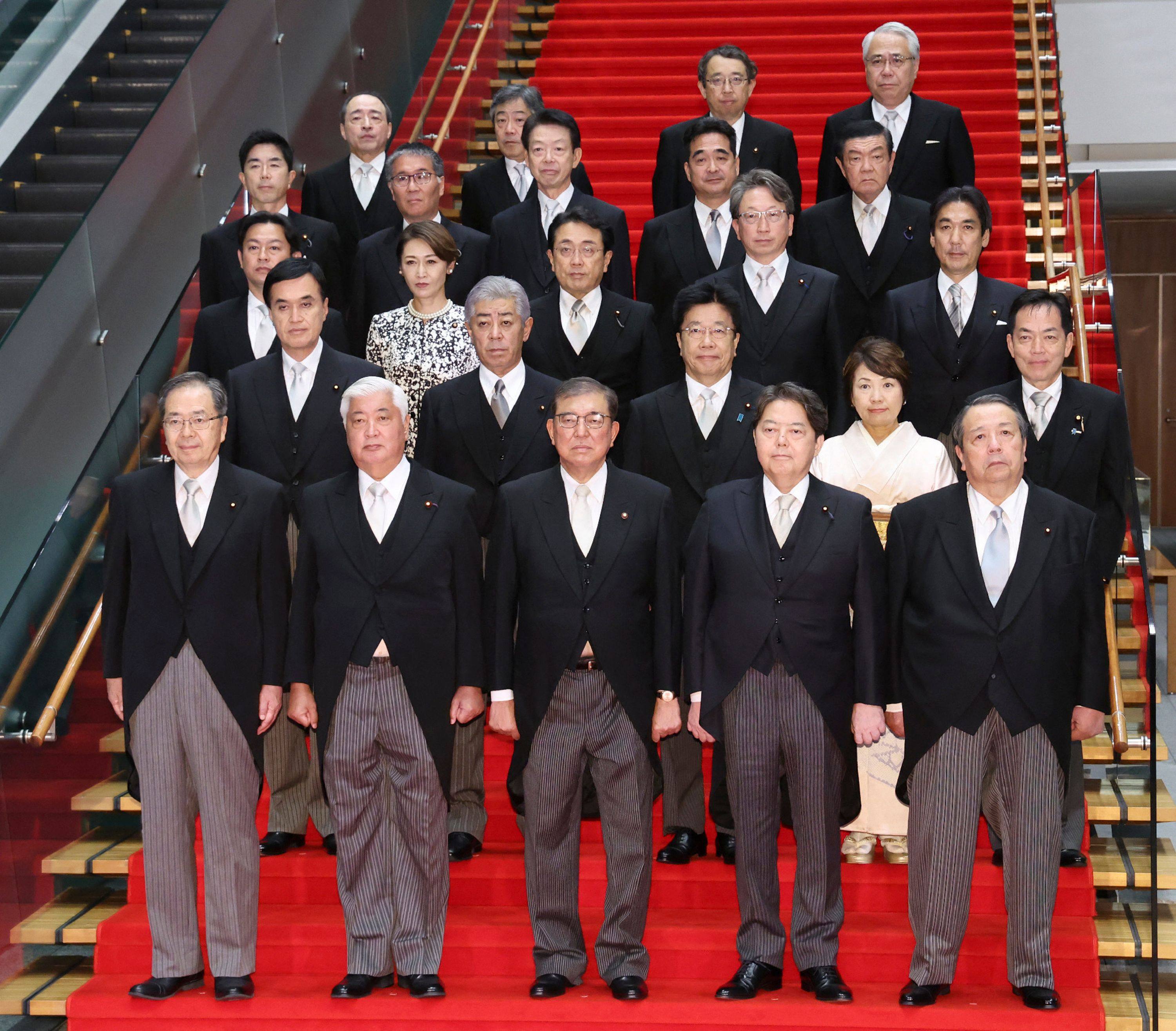 Japan’s new Prime Minister Shigeru Ishiba (front, centre) poses for a photo with the members of his cabinet on October 1. Photo: Jiji press/AFP