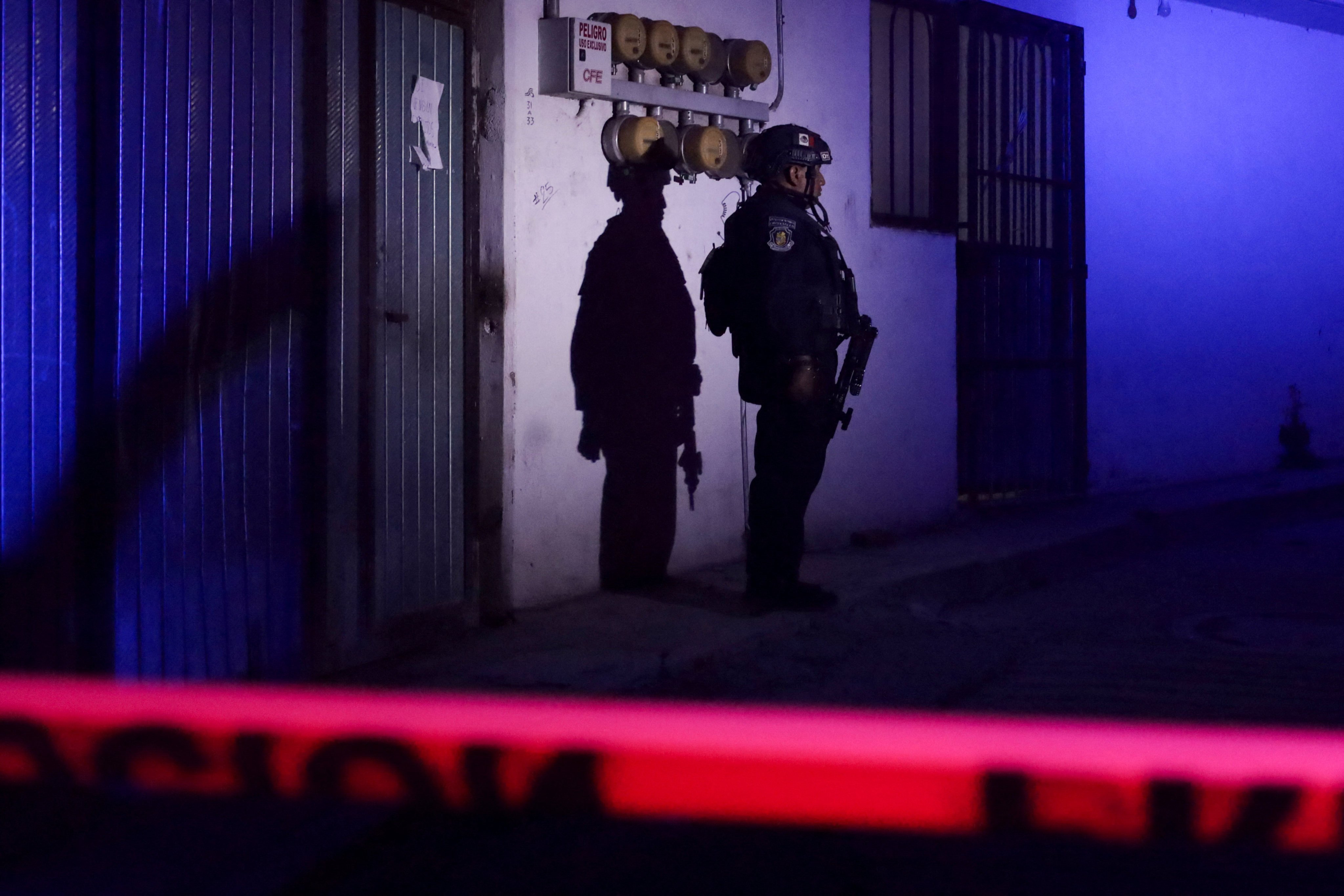 A member of the Mexican security forces at the scene of the killing. Photo: Reuters