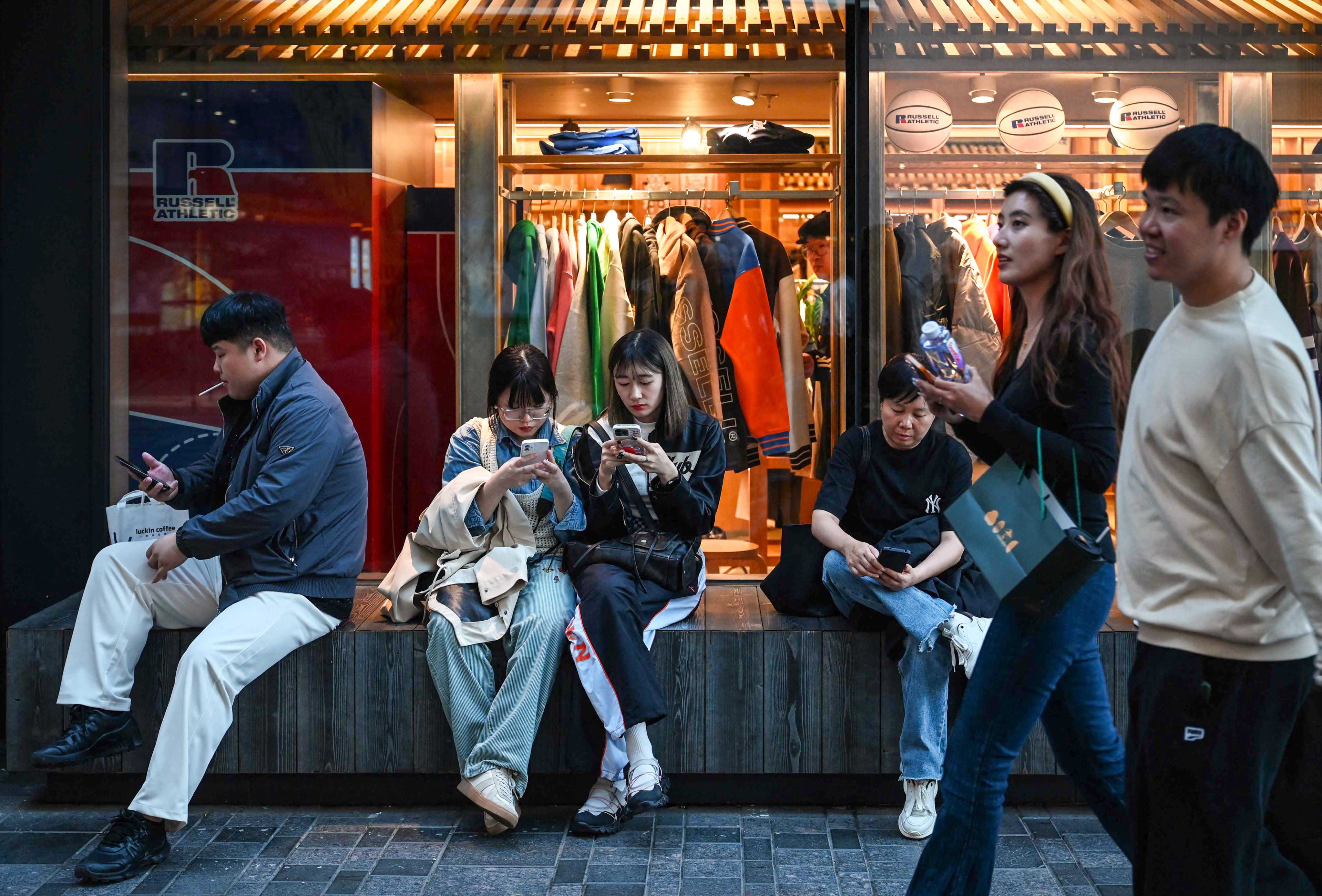 China saw a substantial bump in revenue over the “golden week” holiday as mainland consumers spent more generously. Photo: AFP