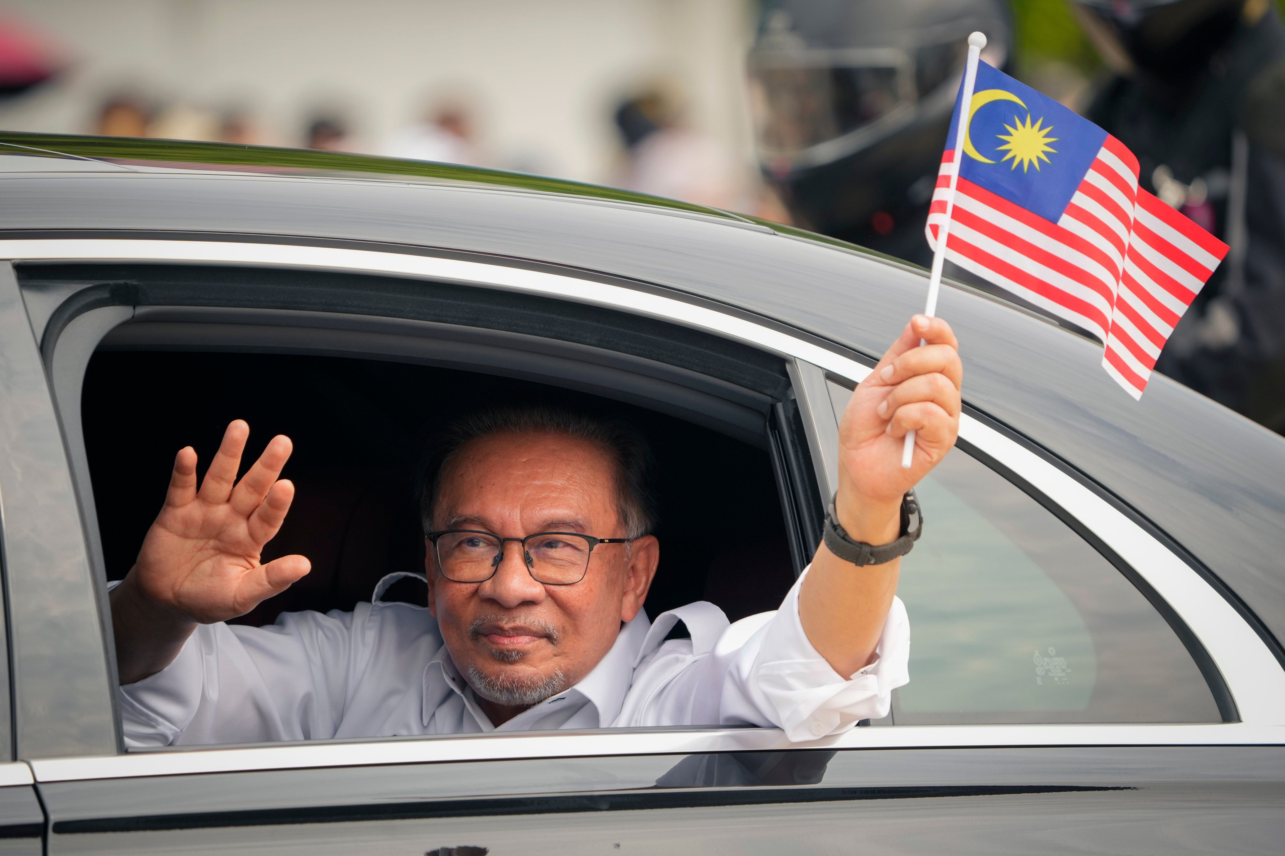 Malaysian Prime Minister Anwar Ibrahim leaving the National Day parade in Putrajaya on August 31. For Anwar, the West is just one of many global players Malaysia must engage with to maximise its strategic advantage. Photo: AP