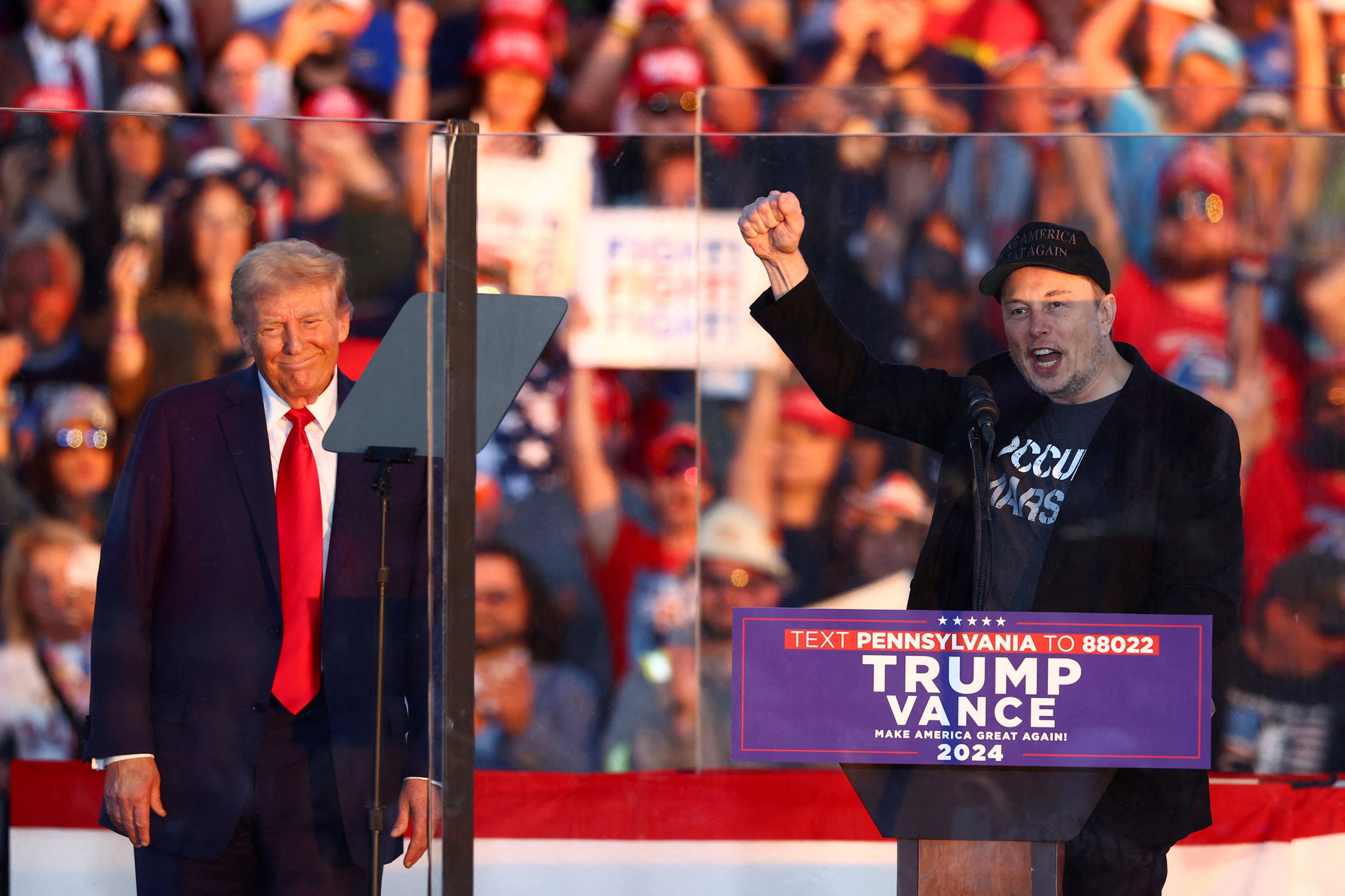 Elon Musk and Donald Trump at a campaign rally in Butler, Pennsylvania on Saturday. On Monday the Supreme Court said it will not hear an appeal from Elon Musk’s X platform over a warrant in Trump’s election-interference case. Photo: Reuters 