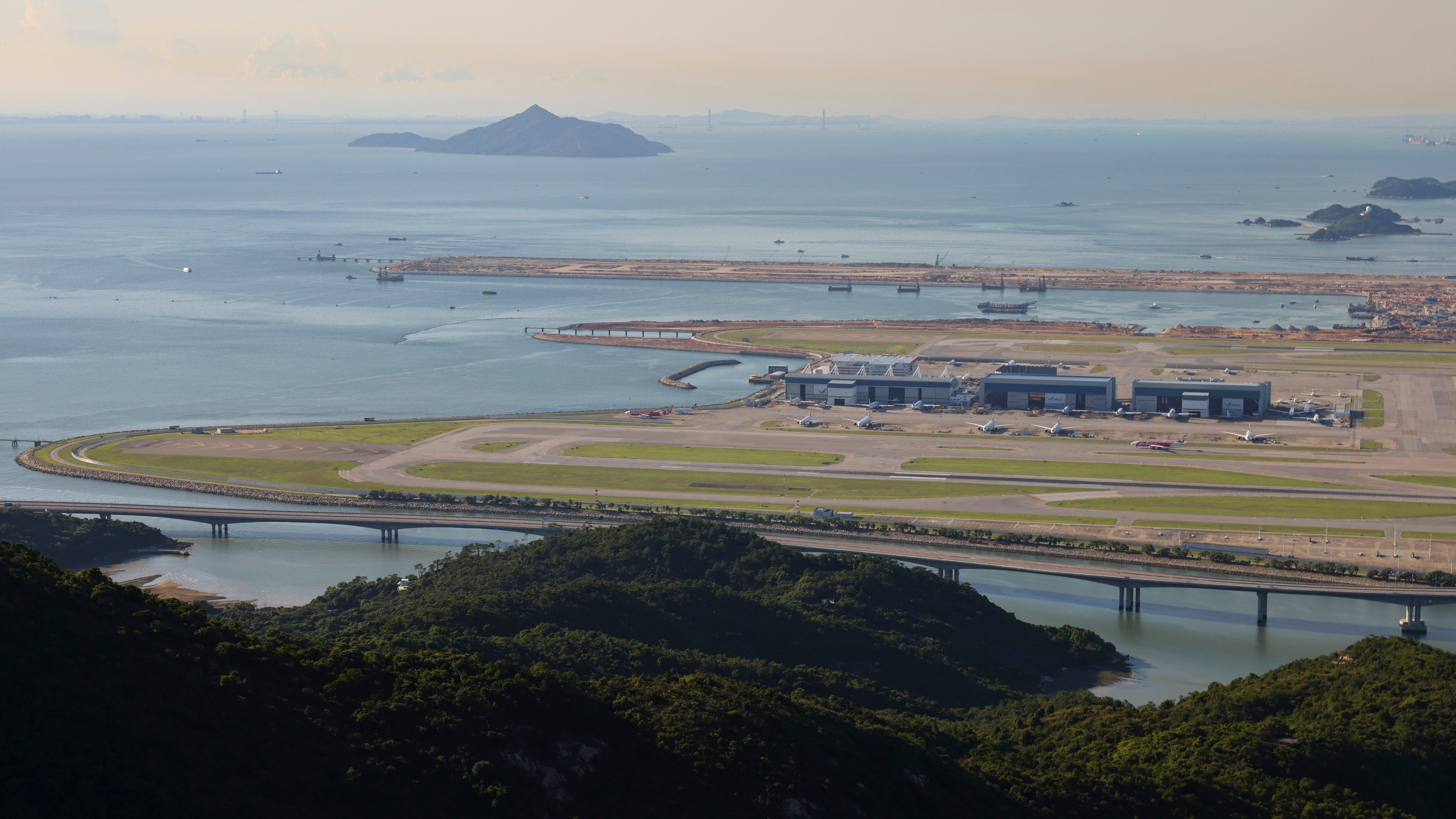 The airport’s expansion project cost HK$141.5 billion and includes a new 3.8km third runway, a second terminal building opposite the existing one and a new concourse. Photo: Dickson Lee