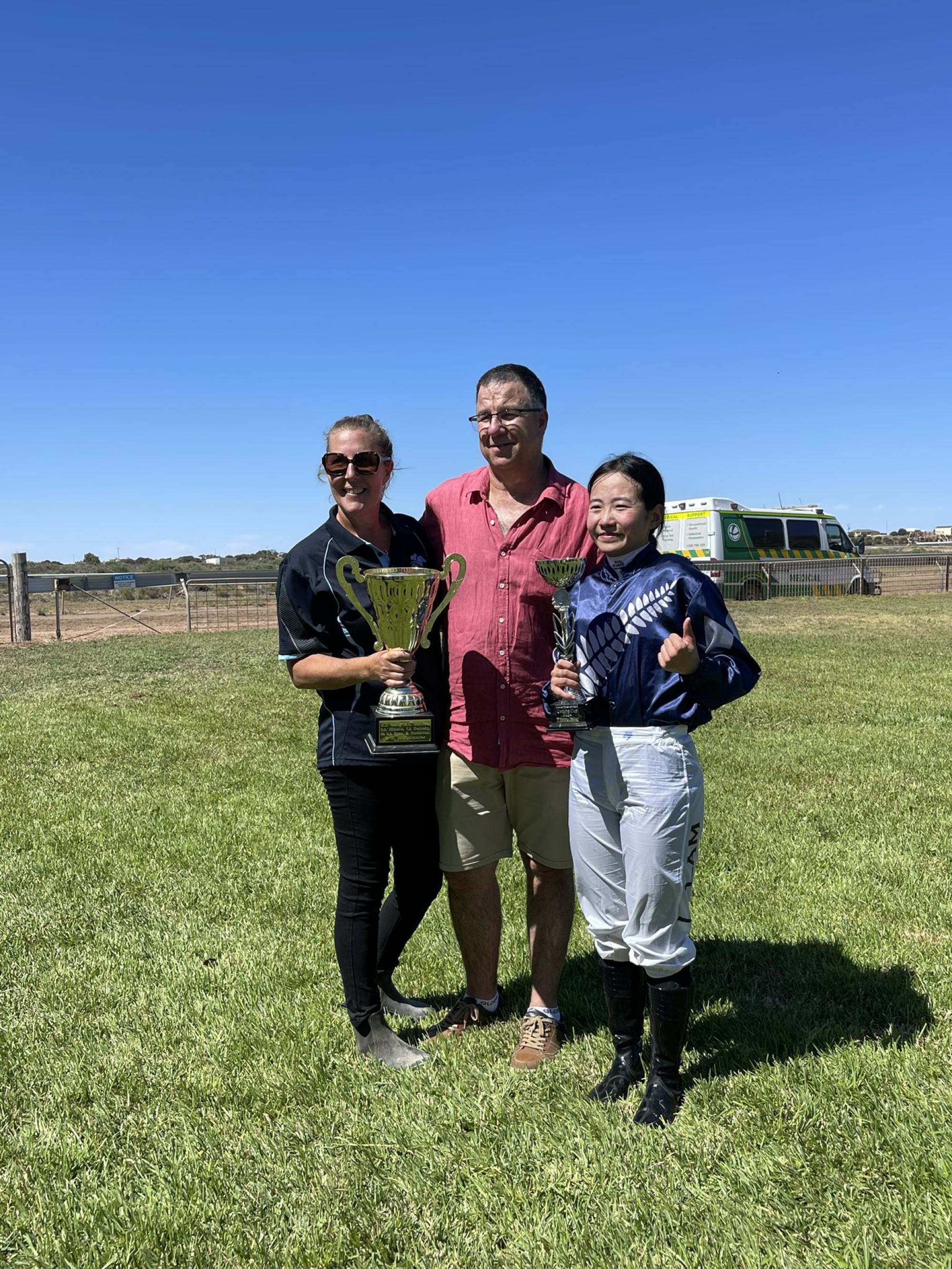 Trainee apprentice Ivy Lam (right) after a winner in Australia.