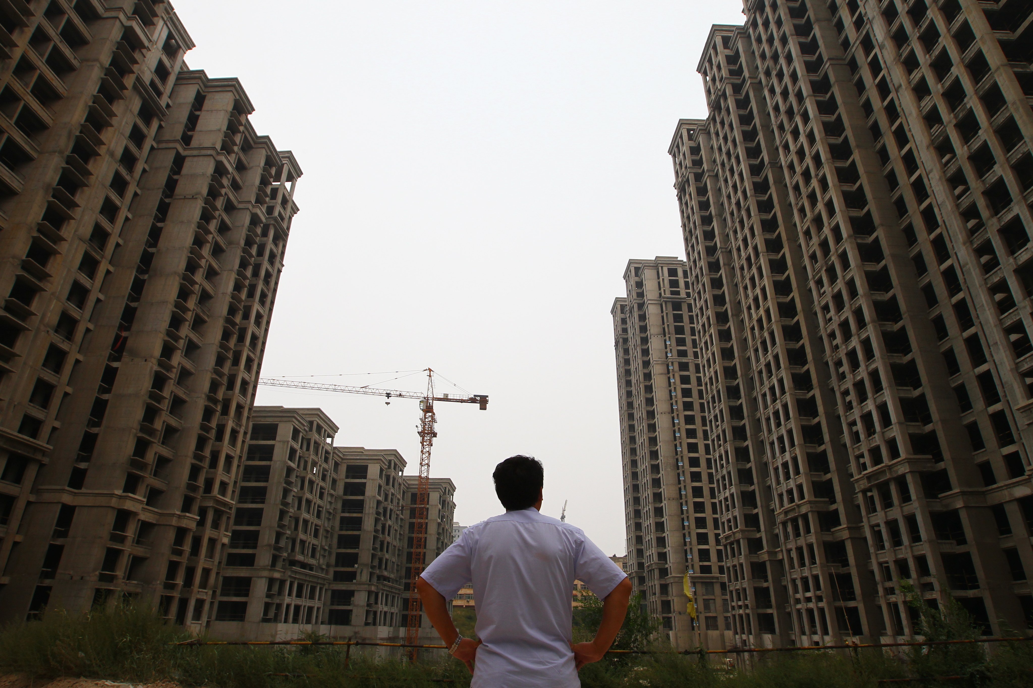 Unfinished apartment buildings are testament to China’s housing market crisis. Photo: Simon Song.