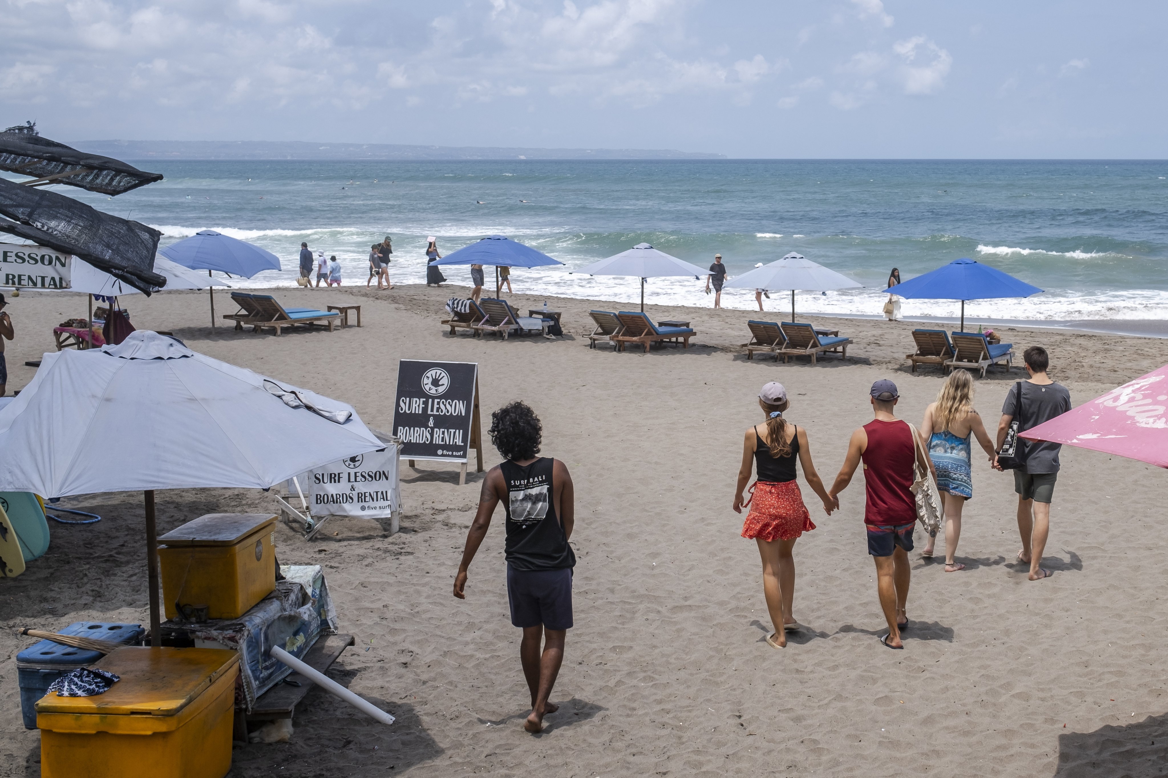 Foreign tourists gather at a beach in Canggu, Bali, Indonesia. Photo: EPA-EFE