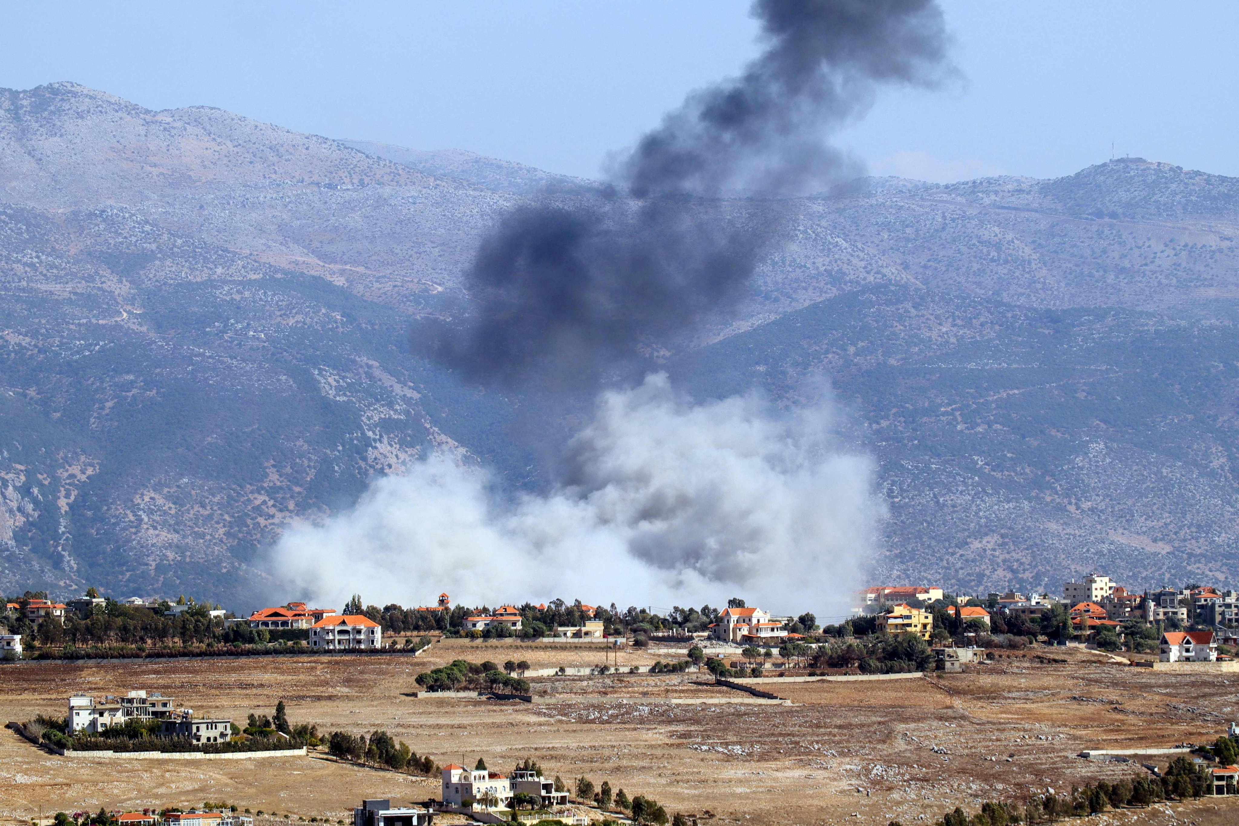 Smoke rises from the site of an Israeli air strike that targeted the southern Lebanese village of Khiam on October 8. Photo: AP