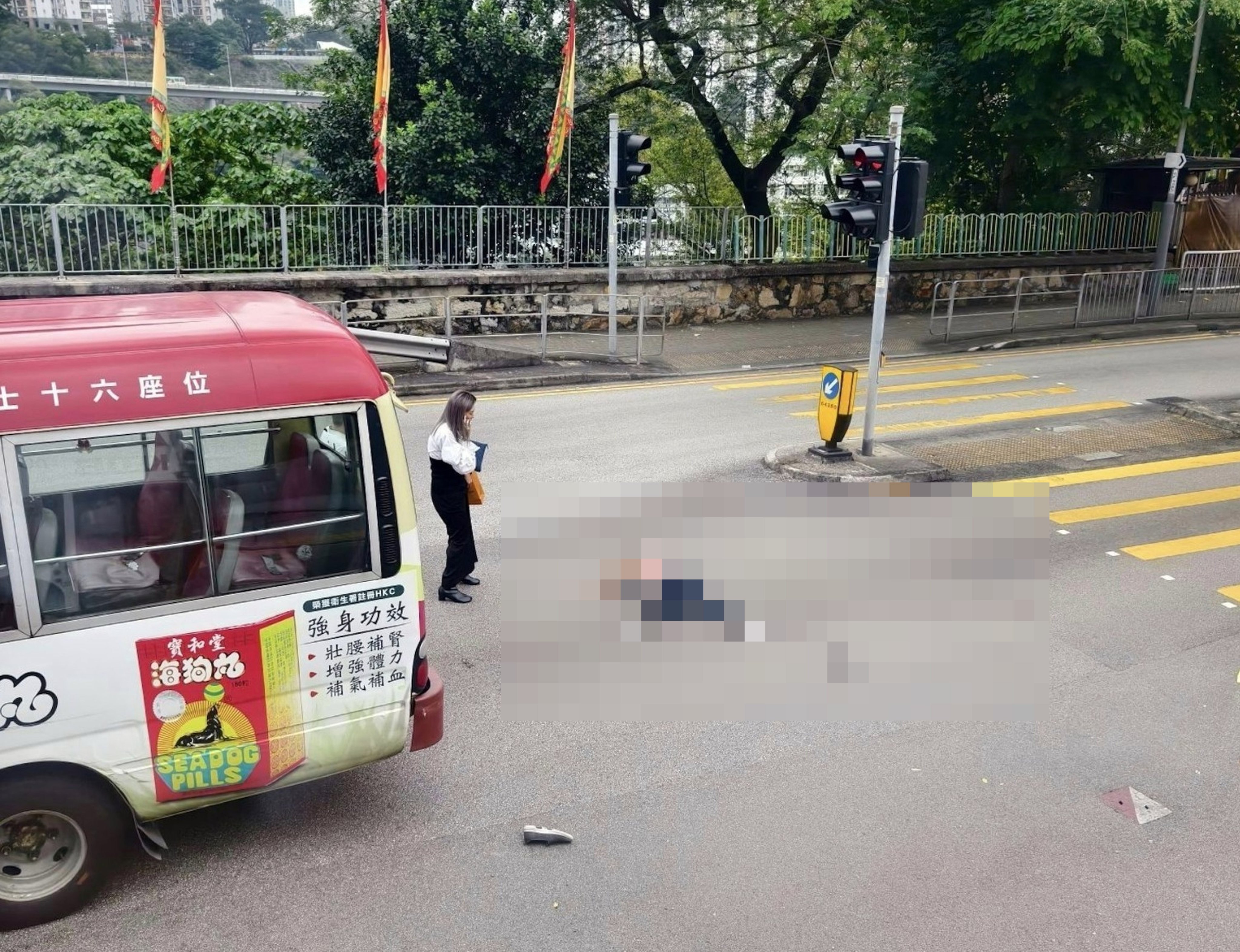 The woman was knocked down on Hiu Kwong Street near the junction with Sau Ming Road. Photo: SCMP