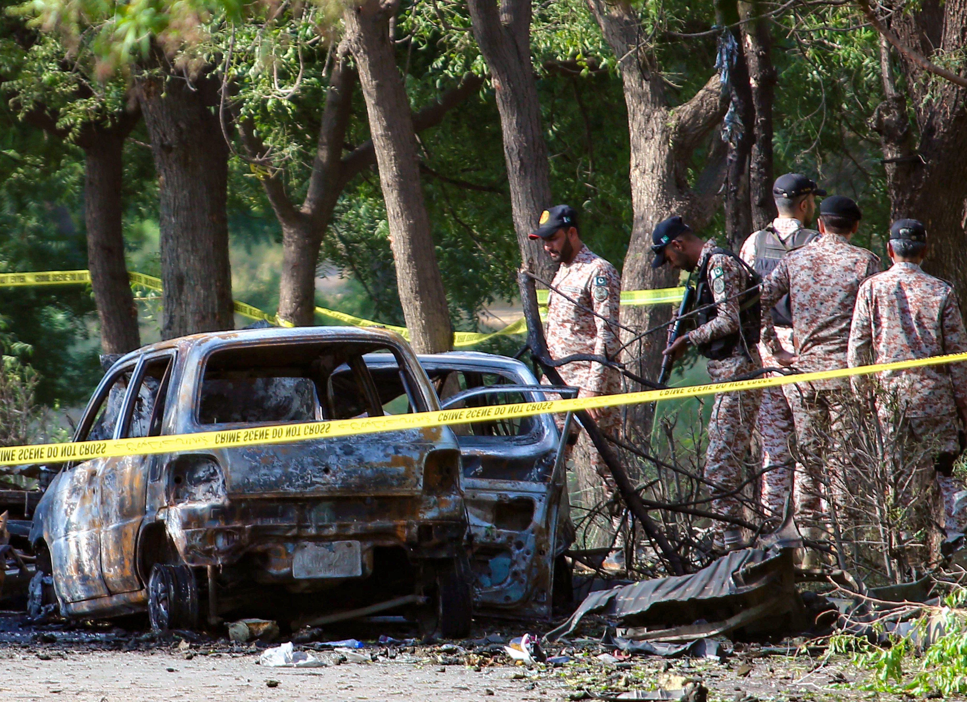 Security officials inspect the scene of a blast near Jinnah International Airport in Karachi, Pakistan. China’s 
Ministry of State Security says combating terrorism is a “shared responsibility of the international community”. Photo: EPA-EFE