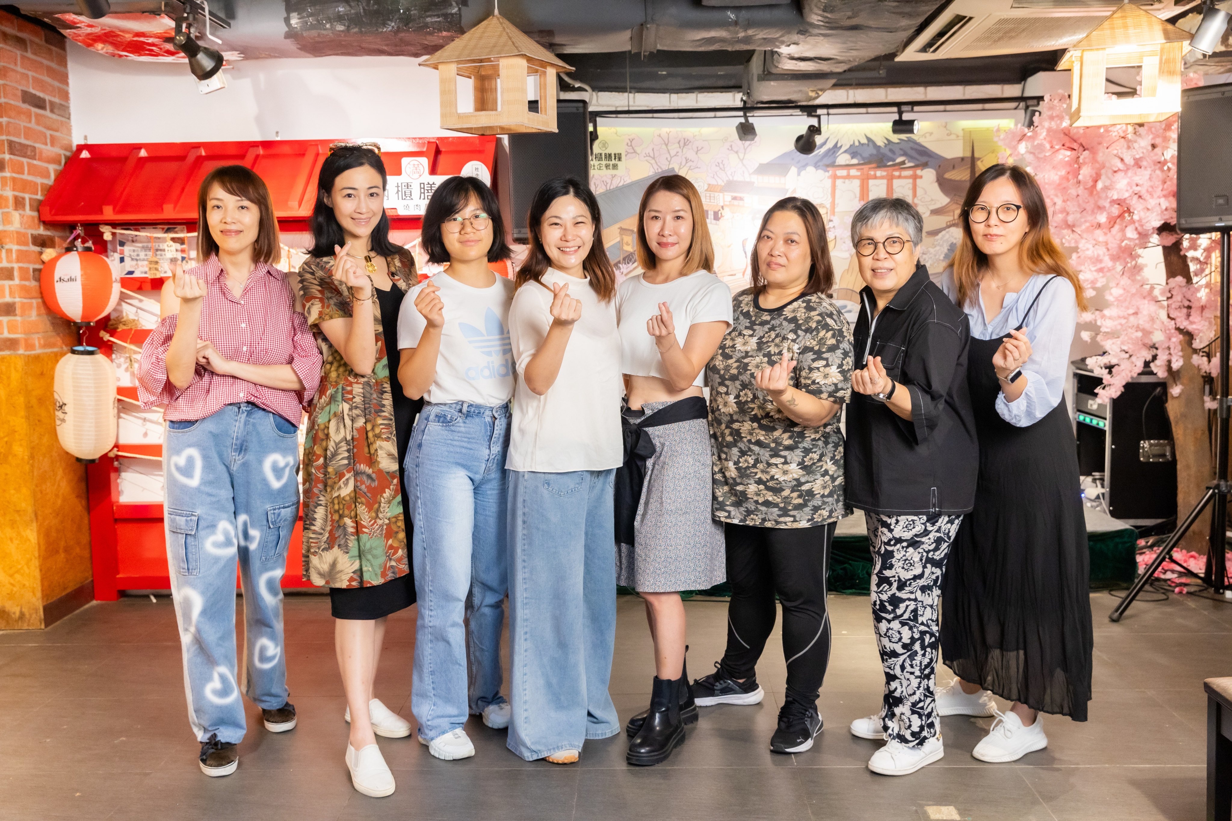 Sisterpeer members Sarah Luk, Camie Law, Vanessa Wun, Vivian Chow, Patsy Chan, Sara Wong Chi-ting, Halina Law and Sarah Hsieh are supporting and encouraging their peers. Photo: Kong Yat-pang