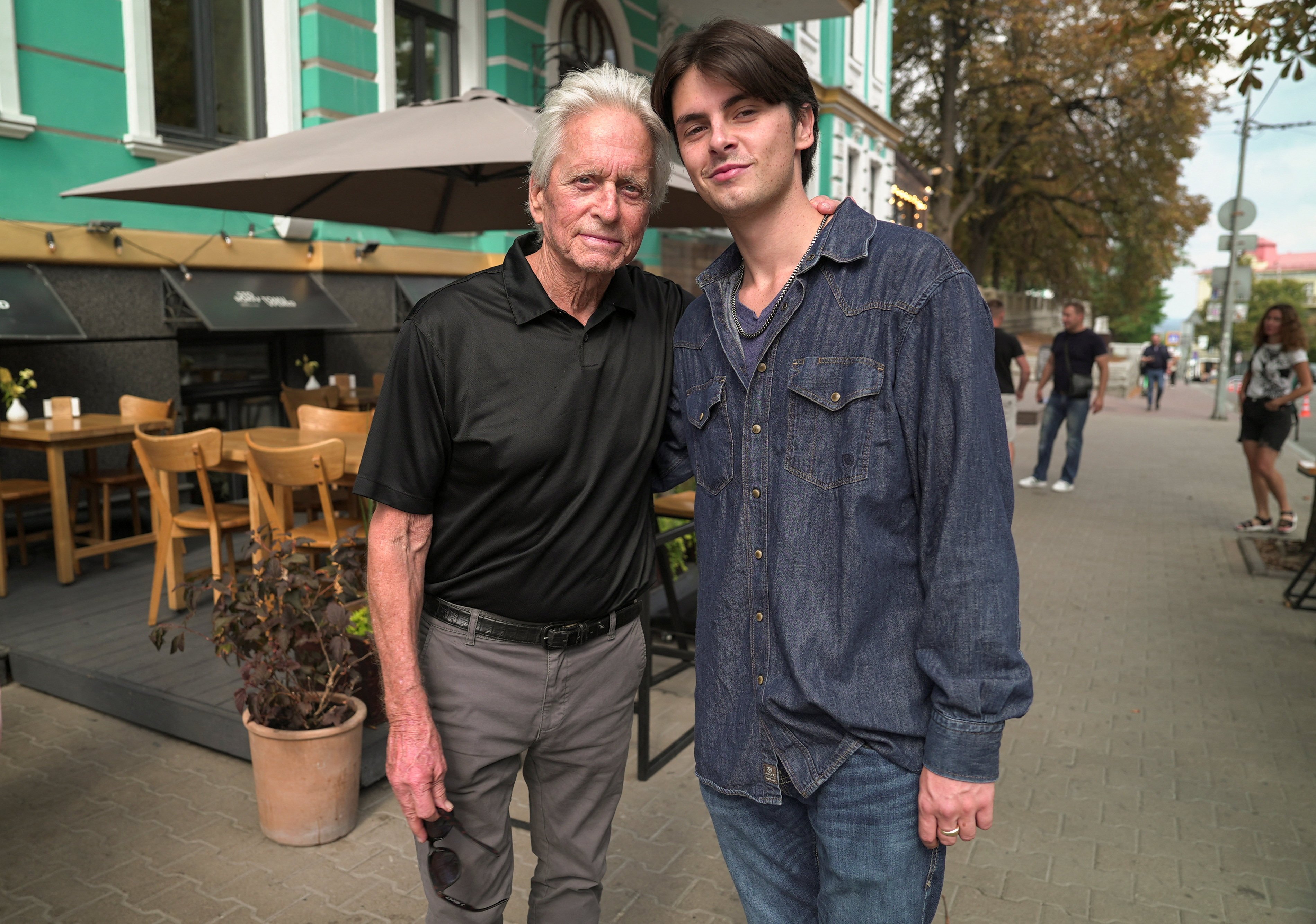 Dylan Douglas, pictured with his father Michael Douglas, wants to make a difference in US politics with his new radio show on SiriusXM Progress. Photo: Reuters