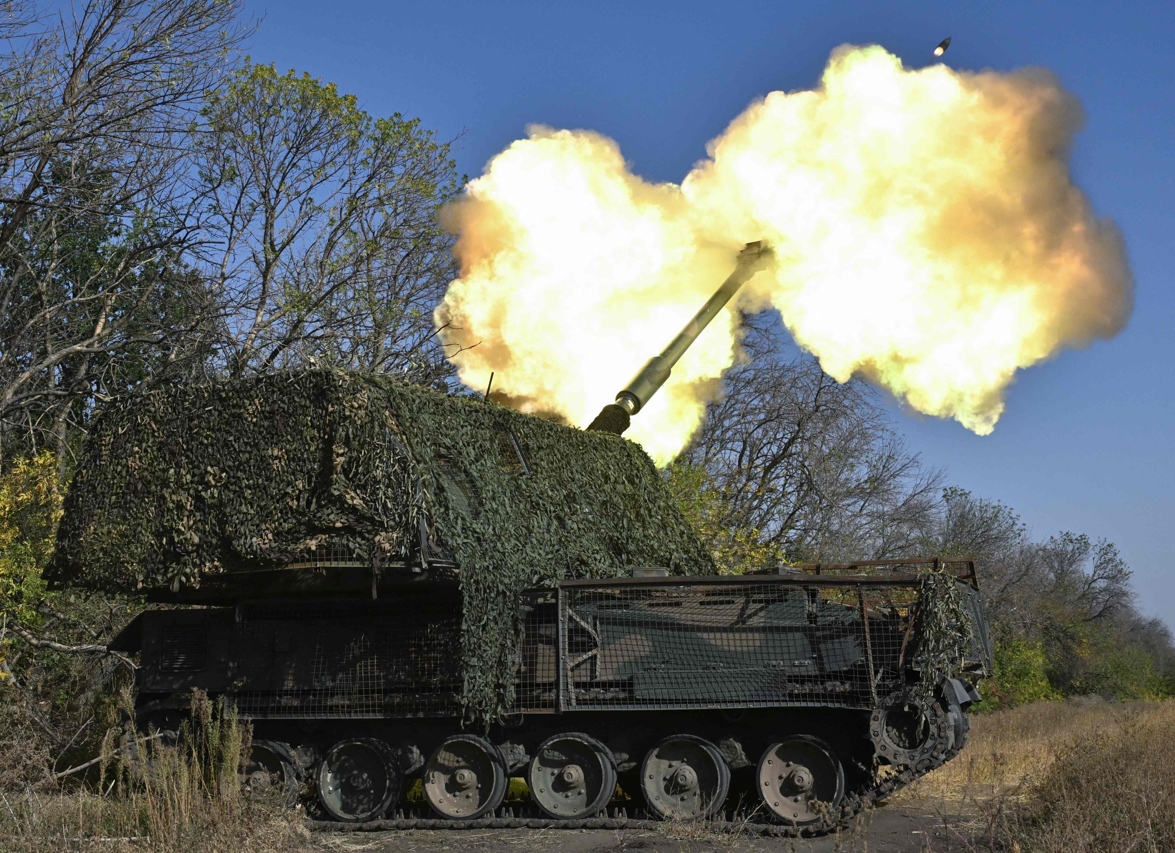 Ukrainian servicemen fire a self-propelled howitzer toward Russian positions near the front line in the Chasiv Yar area in the Donetsk region in September. Photo: AFP