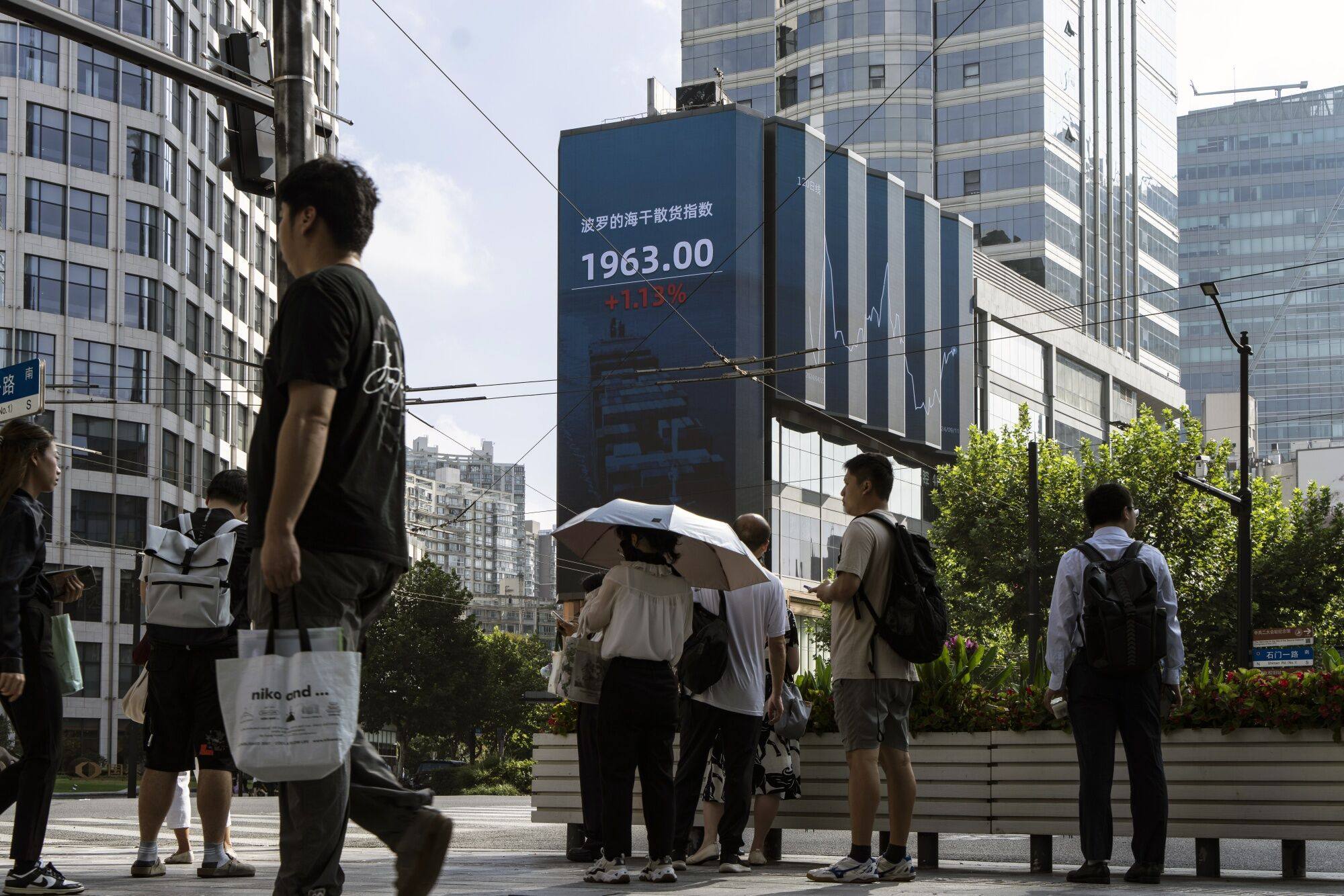 A public screen displaying financial figures in Shanghai. Photo: Bloomberg