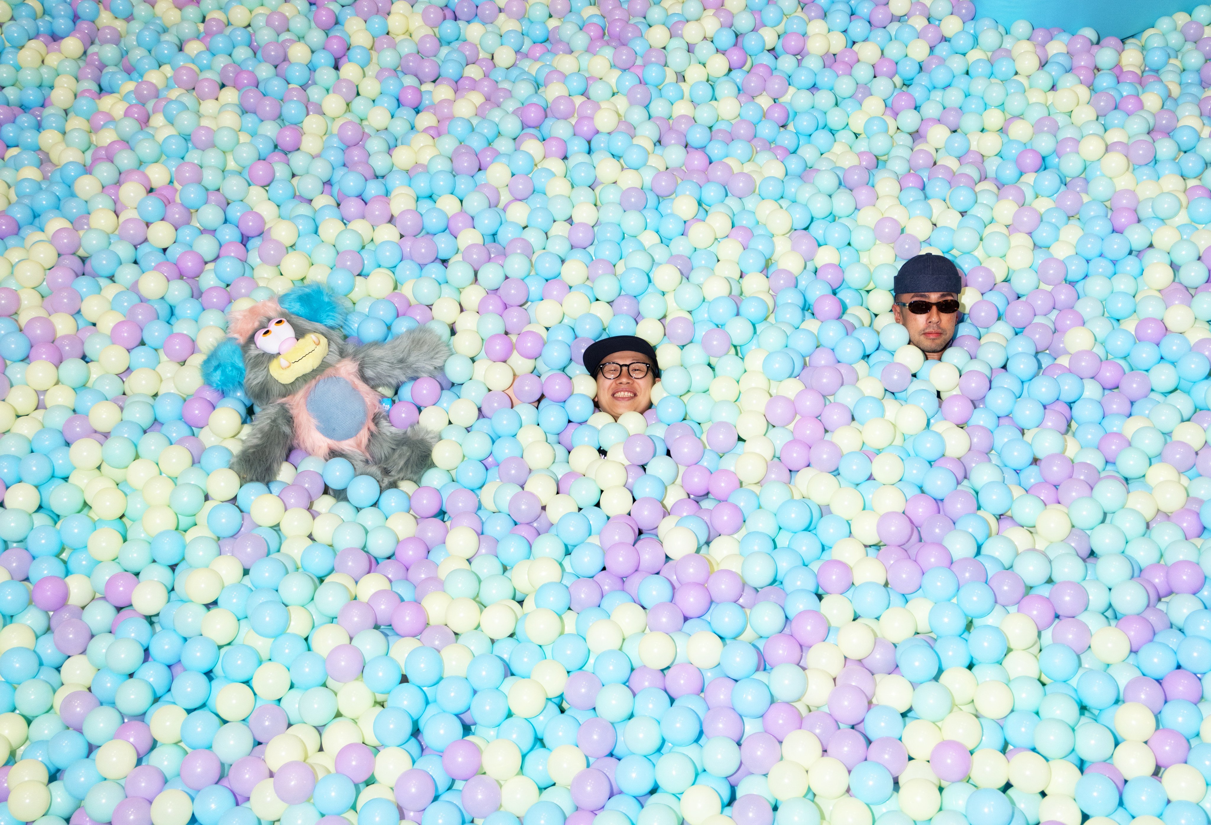 Verdy and Kevin Poon in the Visty Playground ball pit in Pacific Place, Hong Kong. Photo: Jocelyn Tam