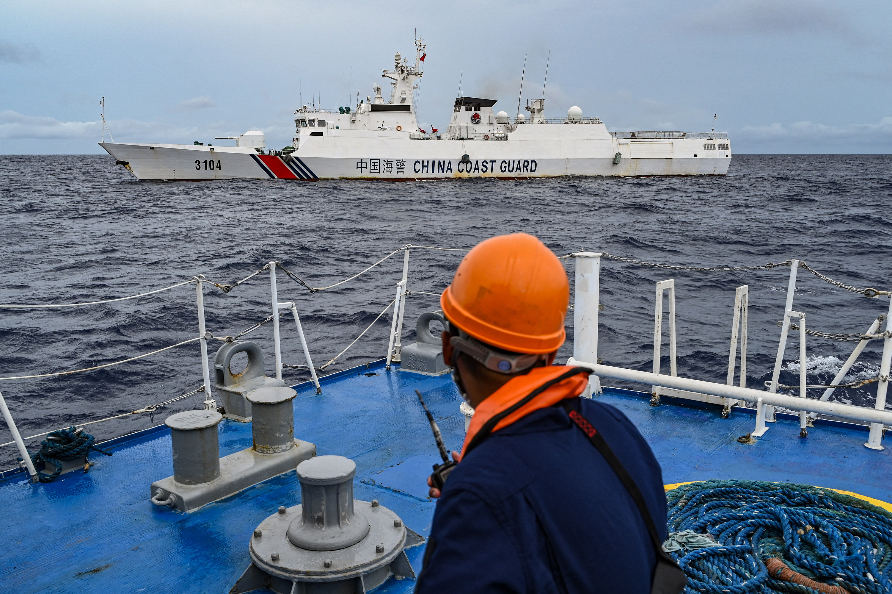 A China Coast Guard ship is seen from the Philippine Coast Guard vessel BRP Cabra during a supply mission to Sabina Shoal in disputed waters of the South China Sea in August. Photo: TNS