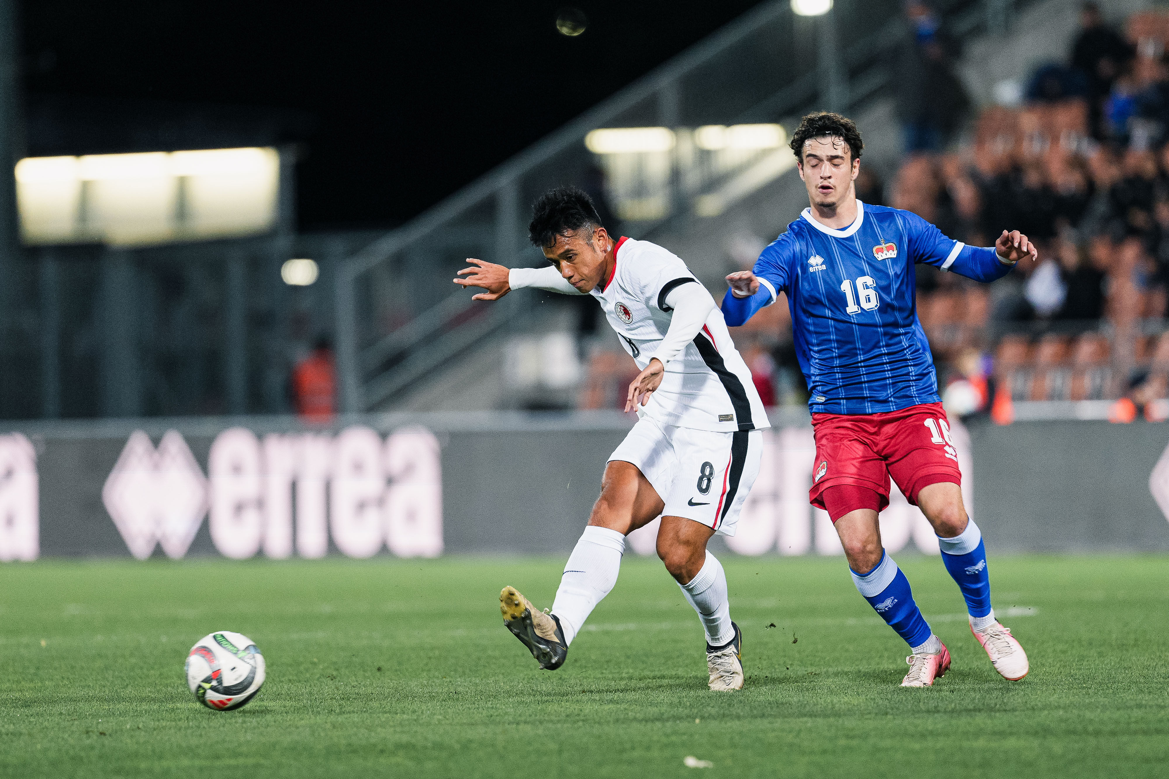 Hong Kong’s Ngan Cheuk-pan (left) in action during the 1-0 defeat to Liechtenstein. Photo: HKFA