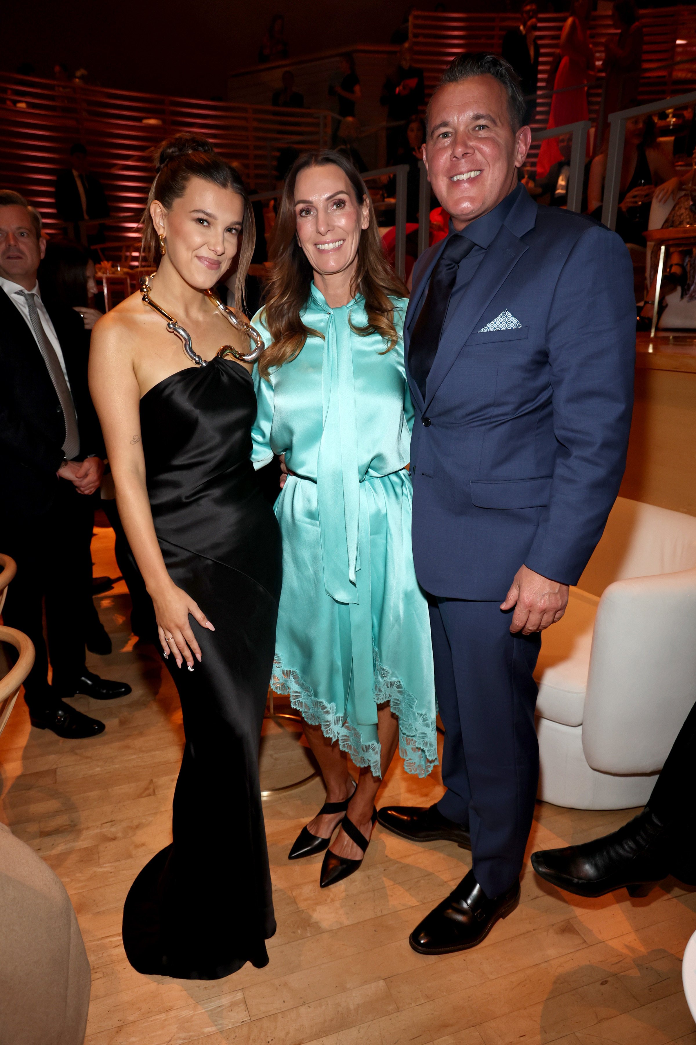 Millie Bobby Brown with her parents Kelly Brown and Robert Brown in 2023. Photo: Getty Images