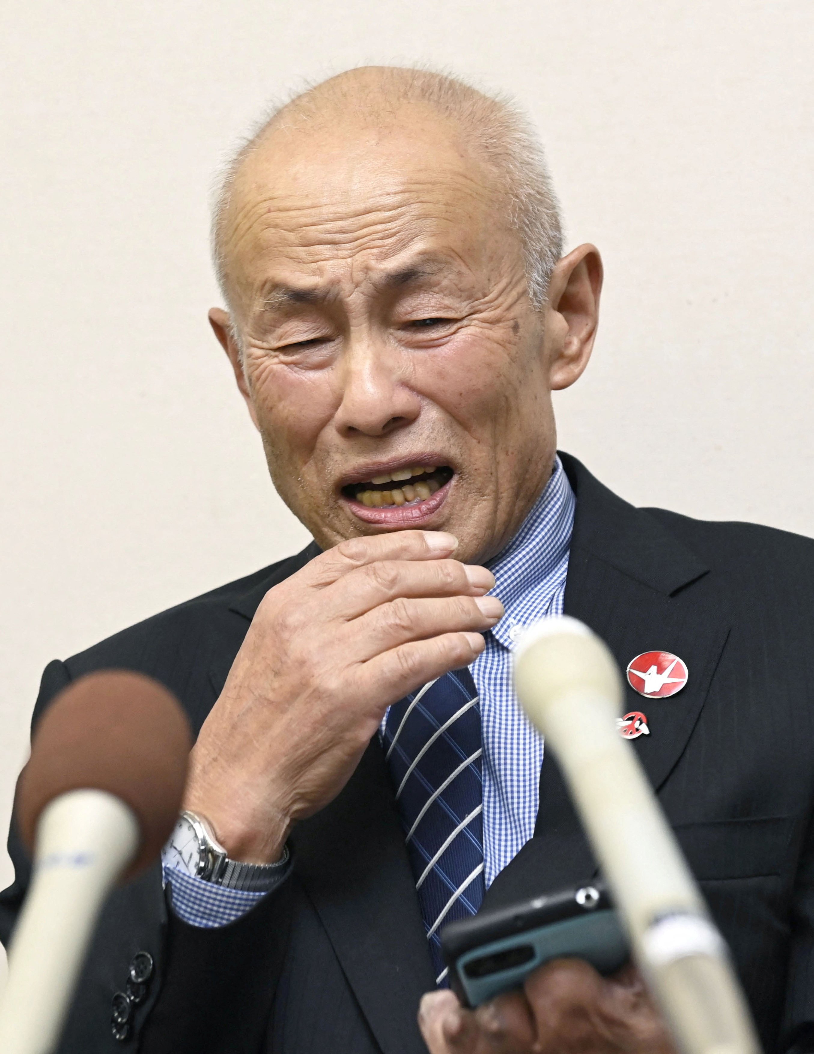 Toshiyuki Mimaki, who survived the 1945 atomic bombing of Hiroshima, reacts after the 2024 Nobel Peace Prize winner, the anti-nuclear group Nihon Hidankyo, was announced on Friday. Photo: Kyodo via Reuters