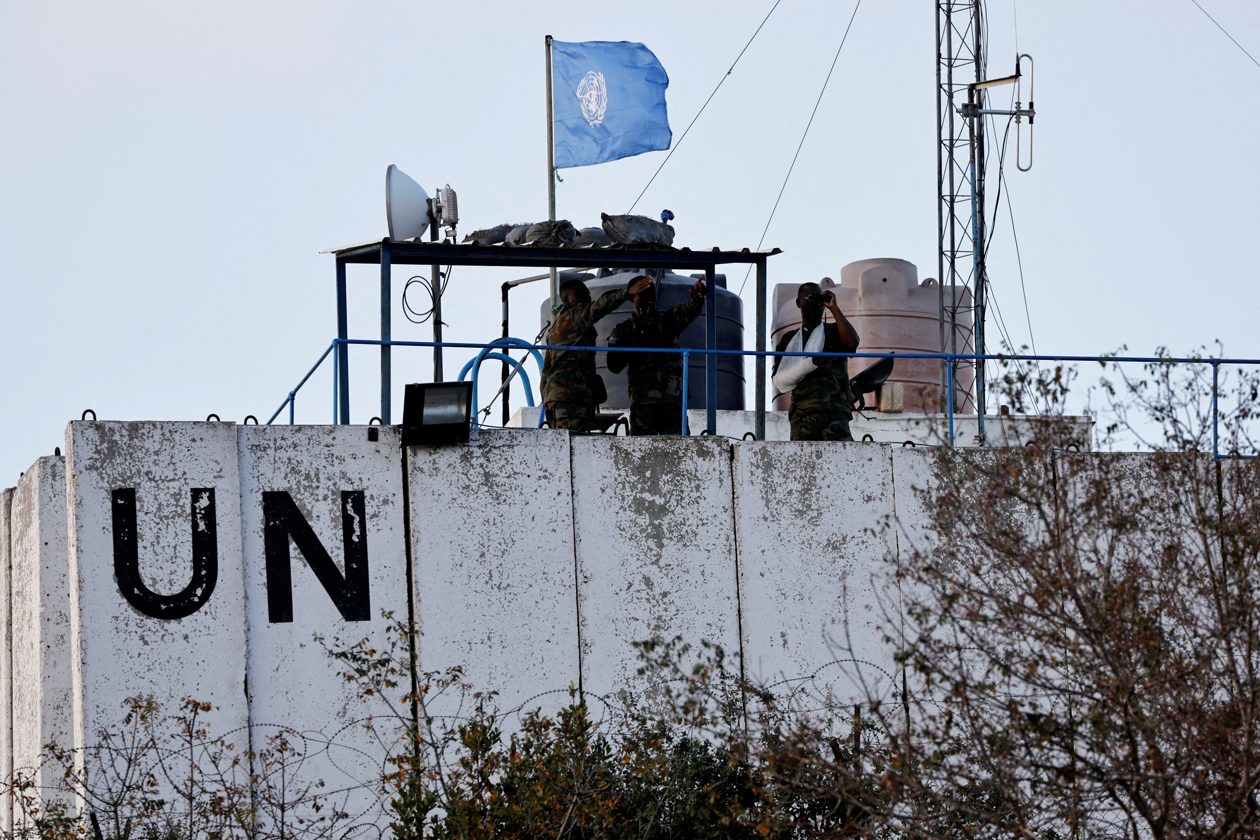 Unifil peacekeepers stand on the roof of a watch tower ‏in the town of Marwahin, southern Lebanon. The mission has about 10,000 peacekeepers stationed in south Lebanon. Photo: Reuters