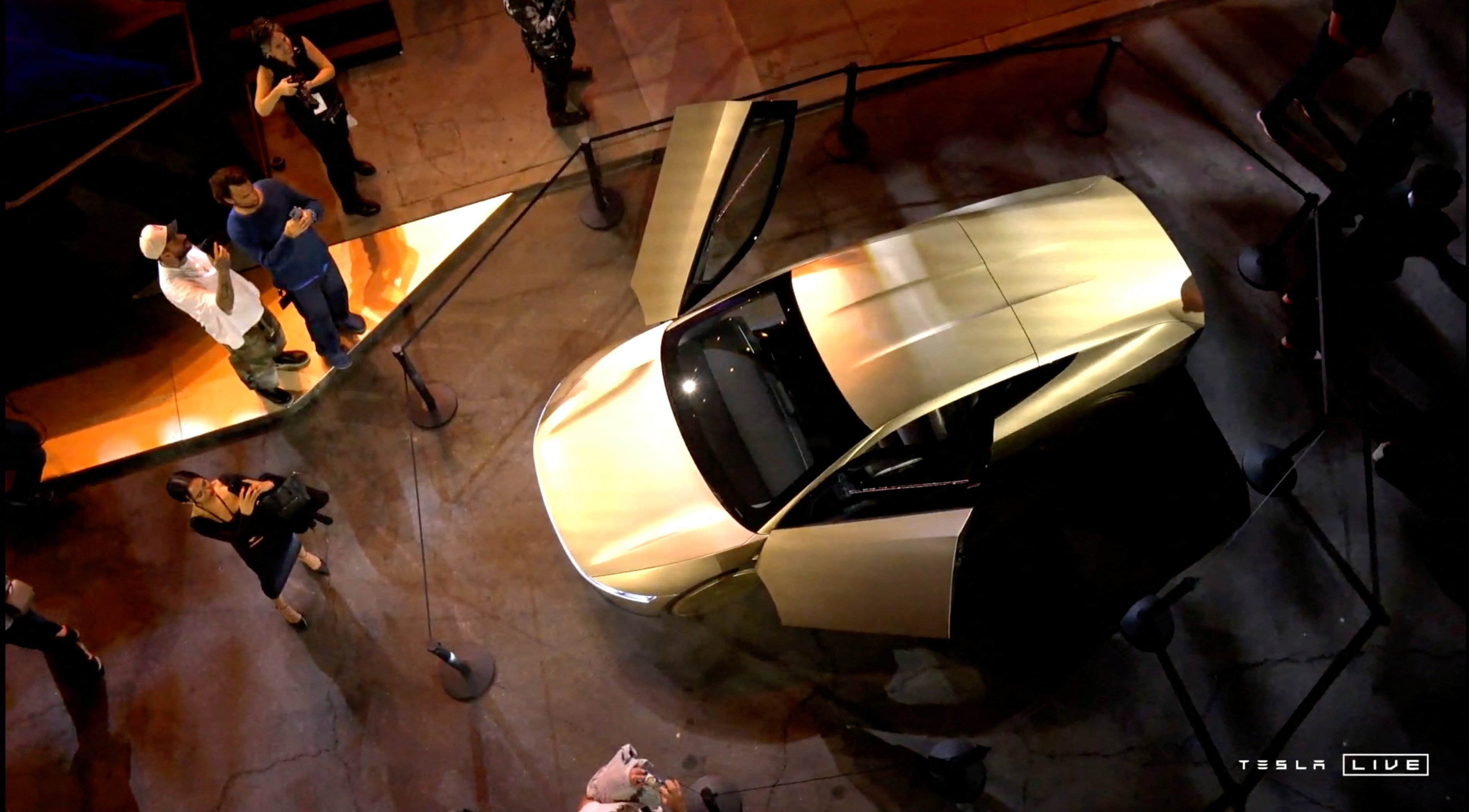 Tesla’s robotaxi is displayed at an unveiling event in Los Angeles, October 10, 2024, in this still image taken from a video. Photo: Handout via Reuters