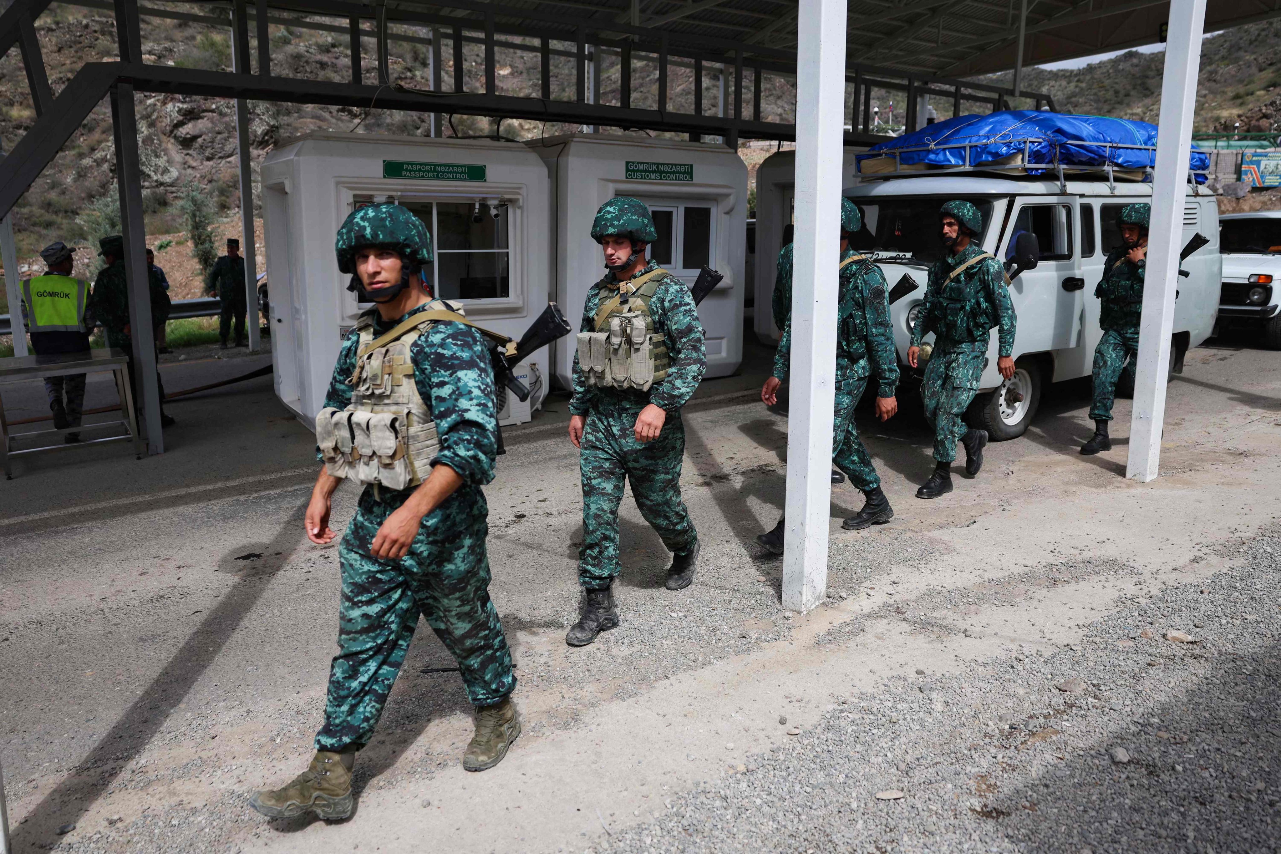 Azerbaijan soldiers walk near the Lachin checkpoint, on September 26 last year. Photo: AFP