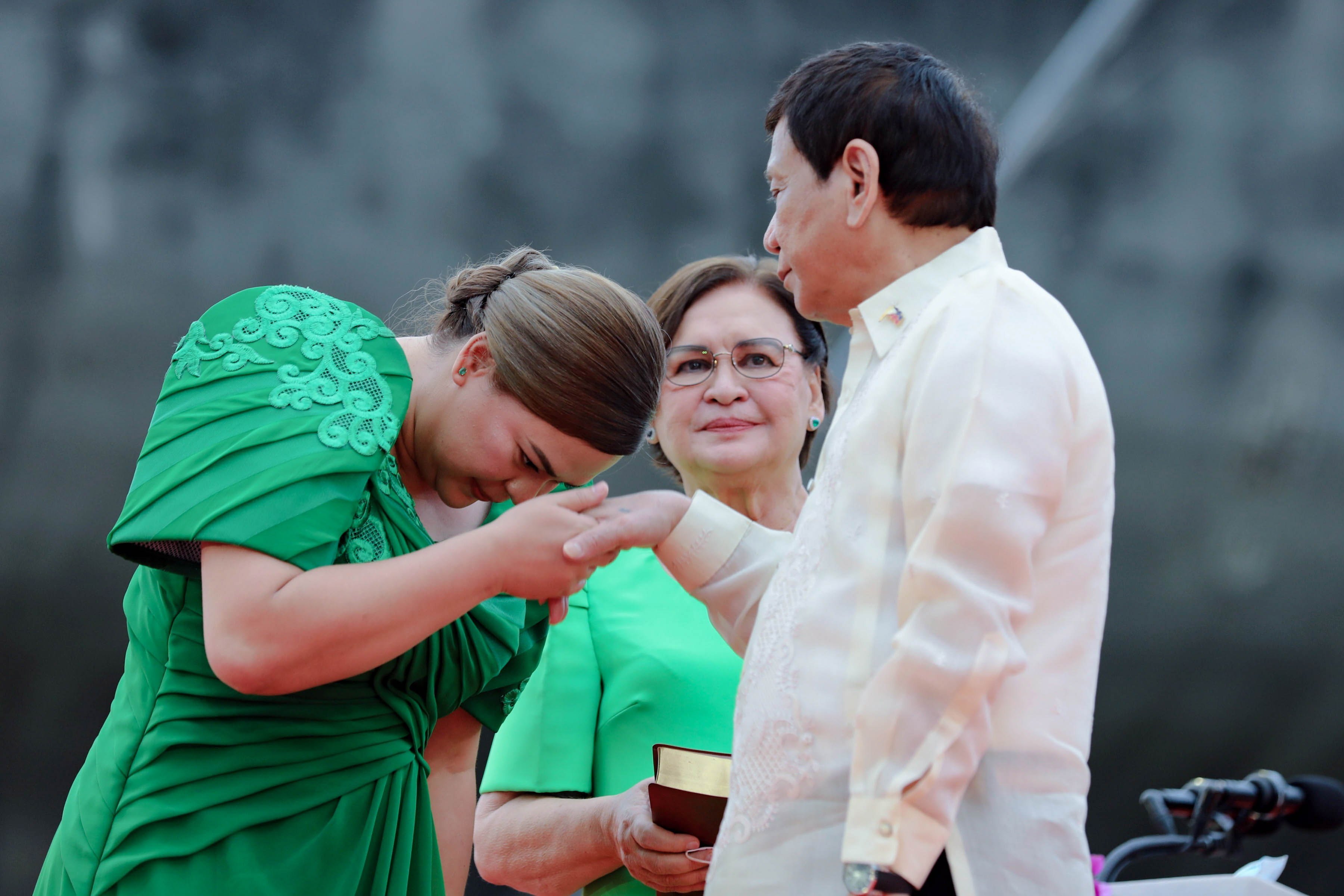 Philippine Vice-President-Sara Duterte greets her father during her inauguration ceremony in 2022. Photo: EPA-EFE