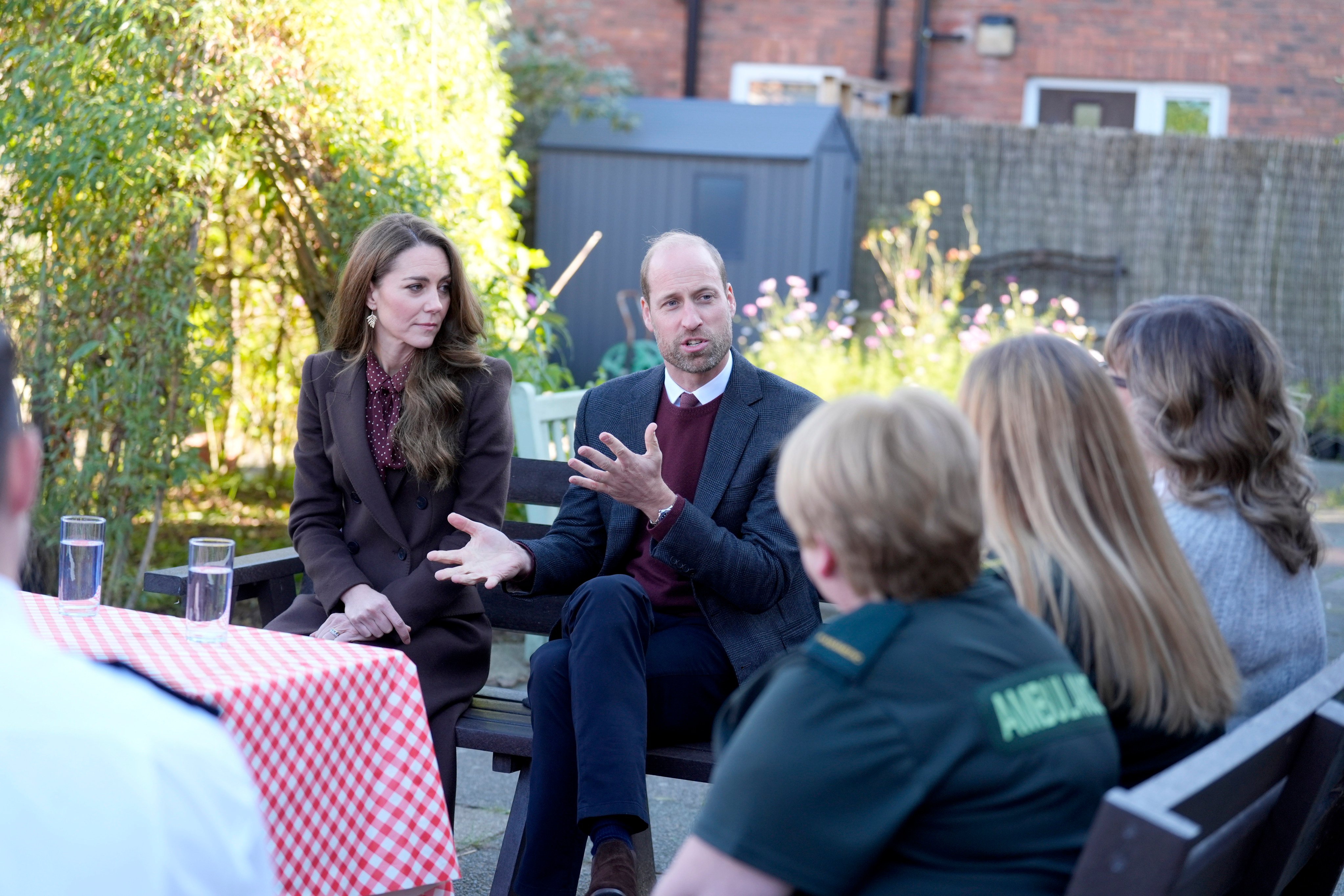 Britain’s Prince William and Kate, Princess of Wales, speak to members of the emergency services during a visit to Southport Community Centre to meet rescuers and the families of those caught up in the Southport knife attack earlier this year, in Southport, England, UK on Thursday. Photo: AP