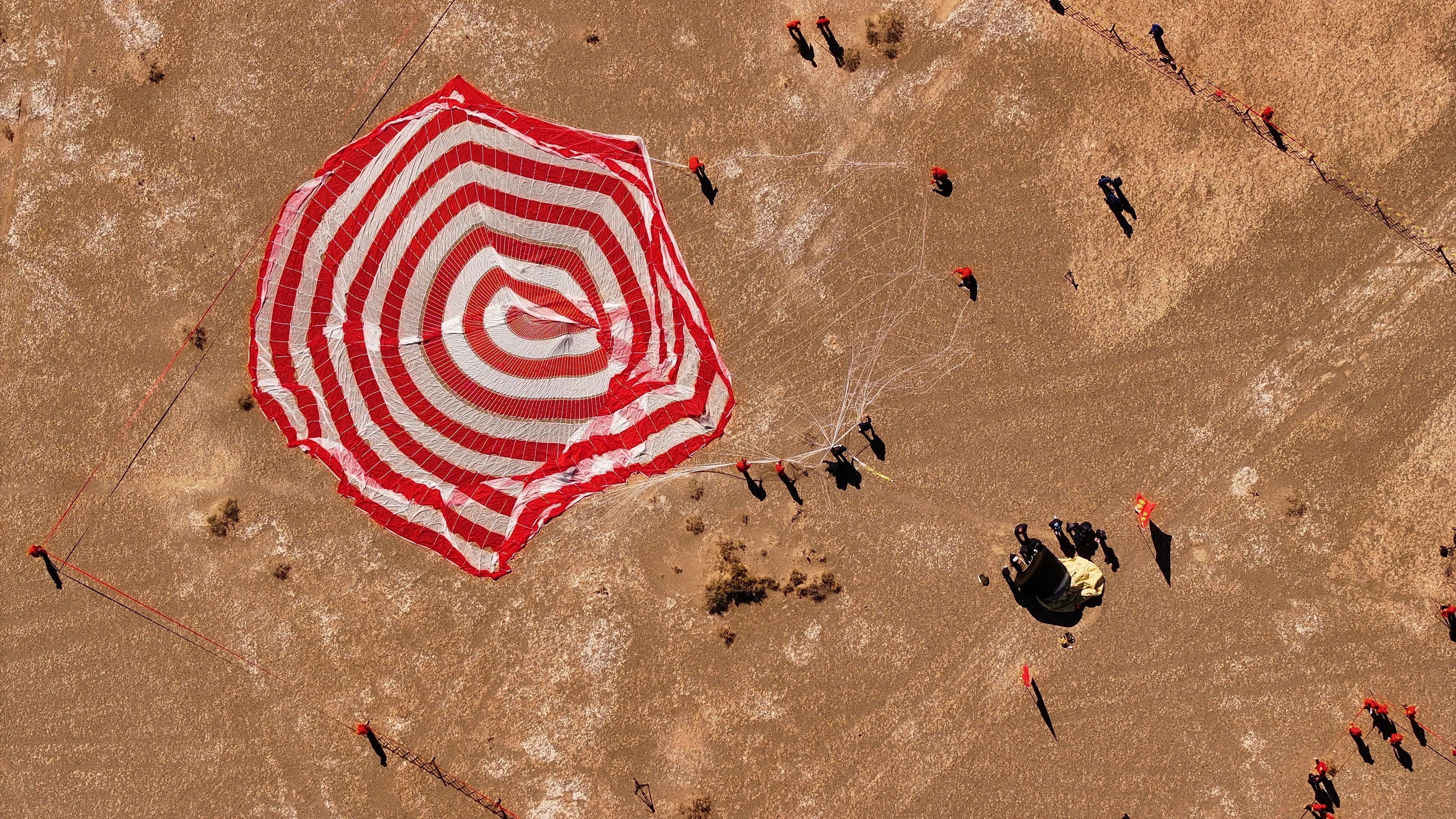 China retrieves its first reusable and returnable test satellite, Shijian-19, at the Dongfeng landing site in Inner Mongolia autonomous region on Friday morning. Photo: EPA-EFE/Xinhua