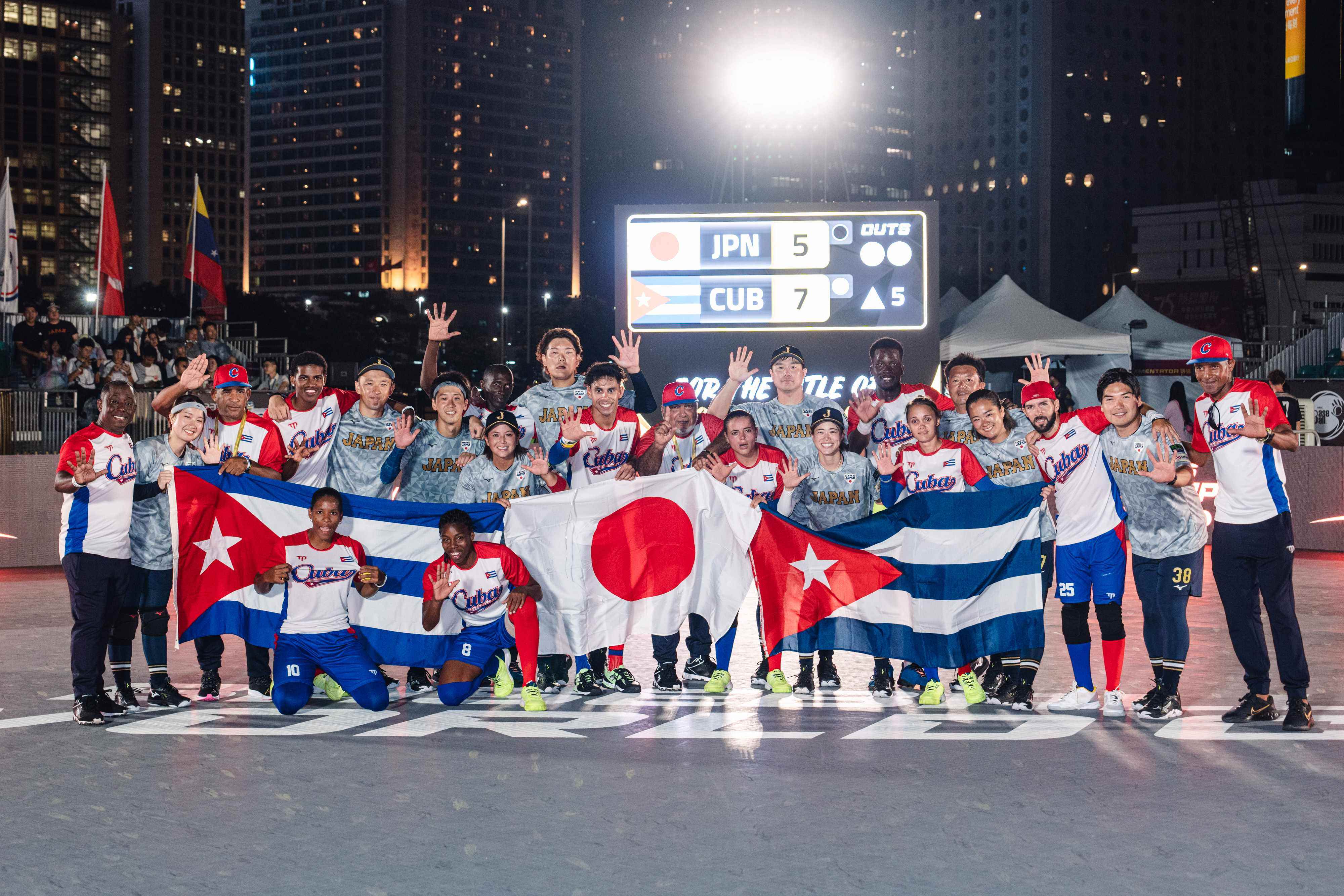 The Cuban and Japanese teams celebrate together after their Baseball5 World Cup final, won again by Cuba. Photo: Clicks images