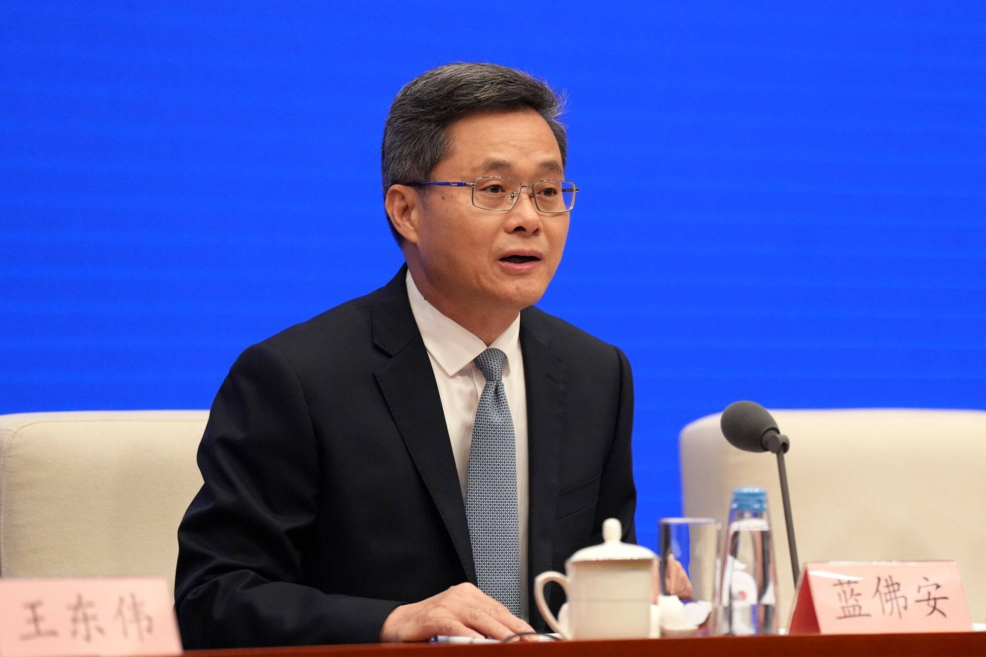 China’s Finance Minister Lan Fo’an during a news conference in Beijing on Saturday. Source: Bloomberg