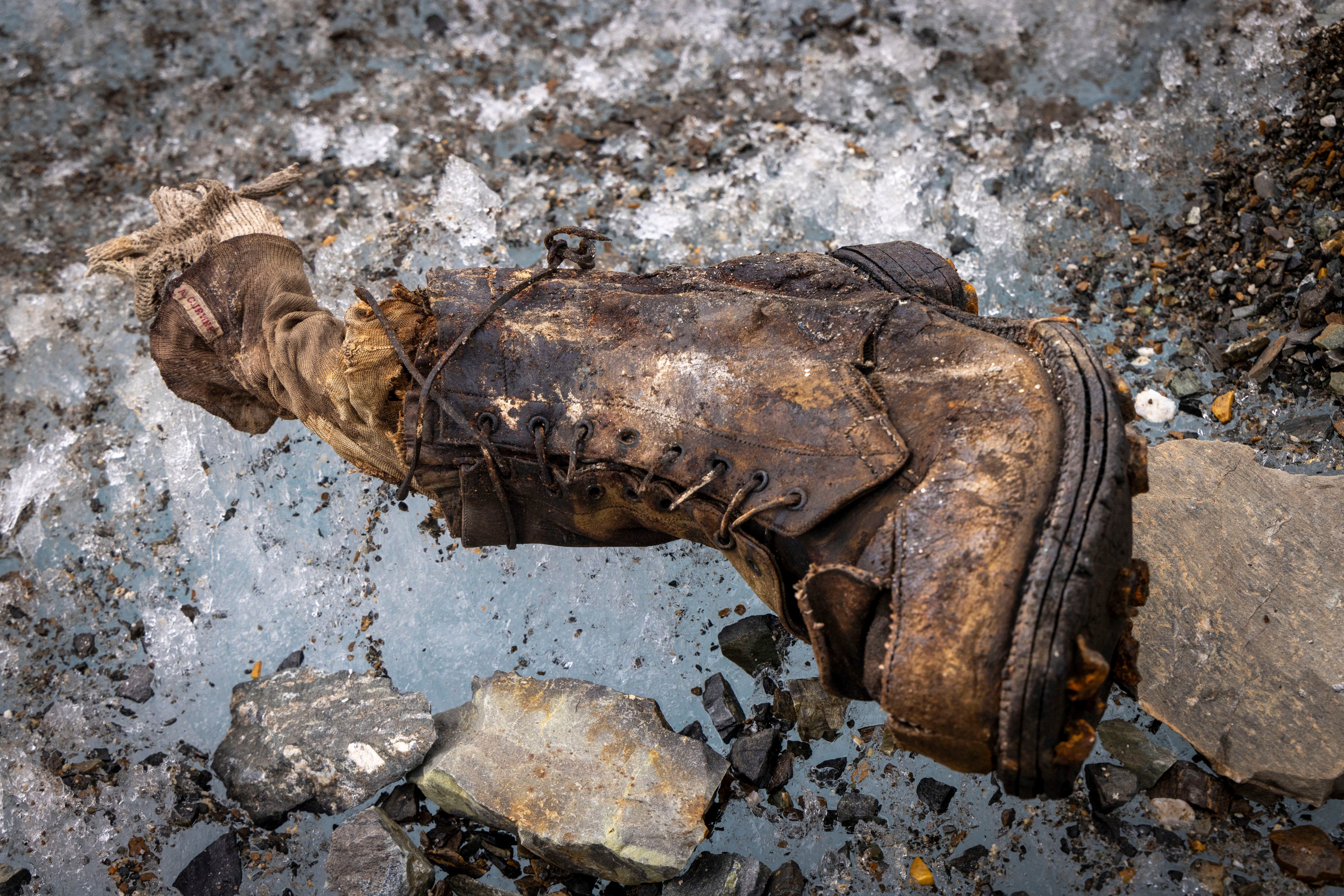 A sock embroidered with “A.C. Irvine”, along with a boot, were discovered on the Central Rongbuk Glacier below the north face of Mount Everest. Photo: Jimmy Chin/National Geographic via AP