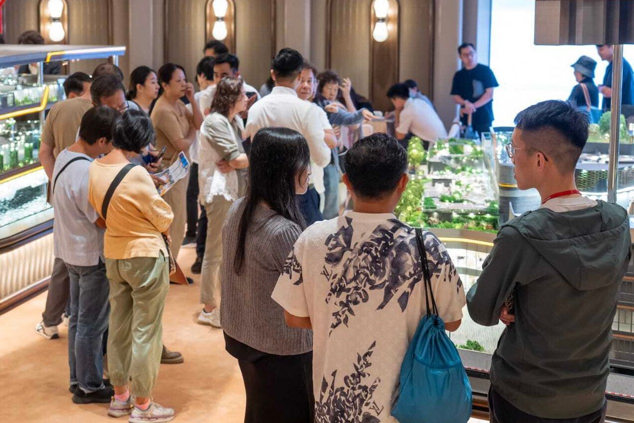 Potential homebuyers look at a model of the Cullinan Sky Phase 1 at Sun Hung Kai showroom. Photo: Handout