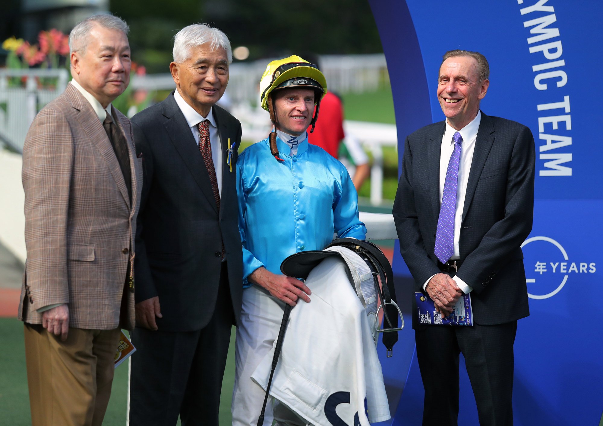 Jockey Zac Purton, John Size (far right) and Wunderbar connections.