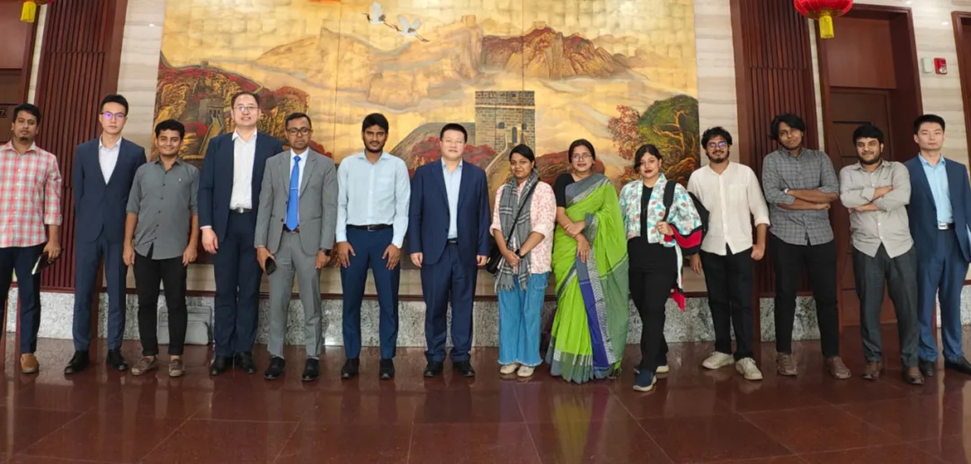 China’s top envoy in Bangladesh Yao Wen (centre) meets members of the South Asian nation’s student movement in Dhaka on Thursday. Photo: qq.com