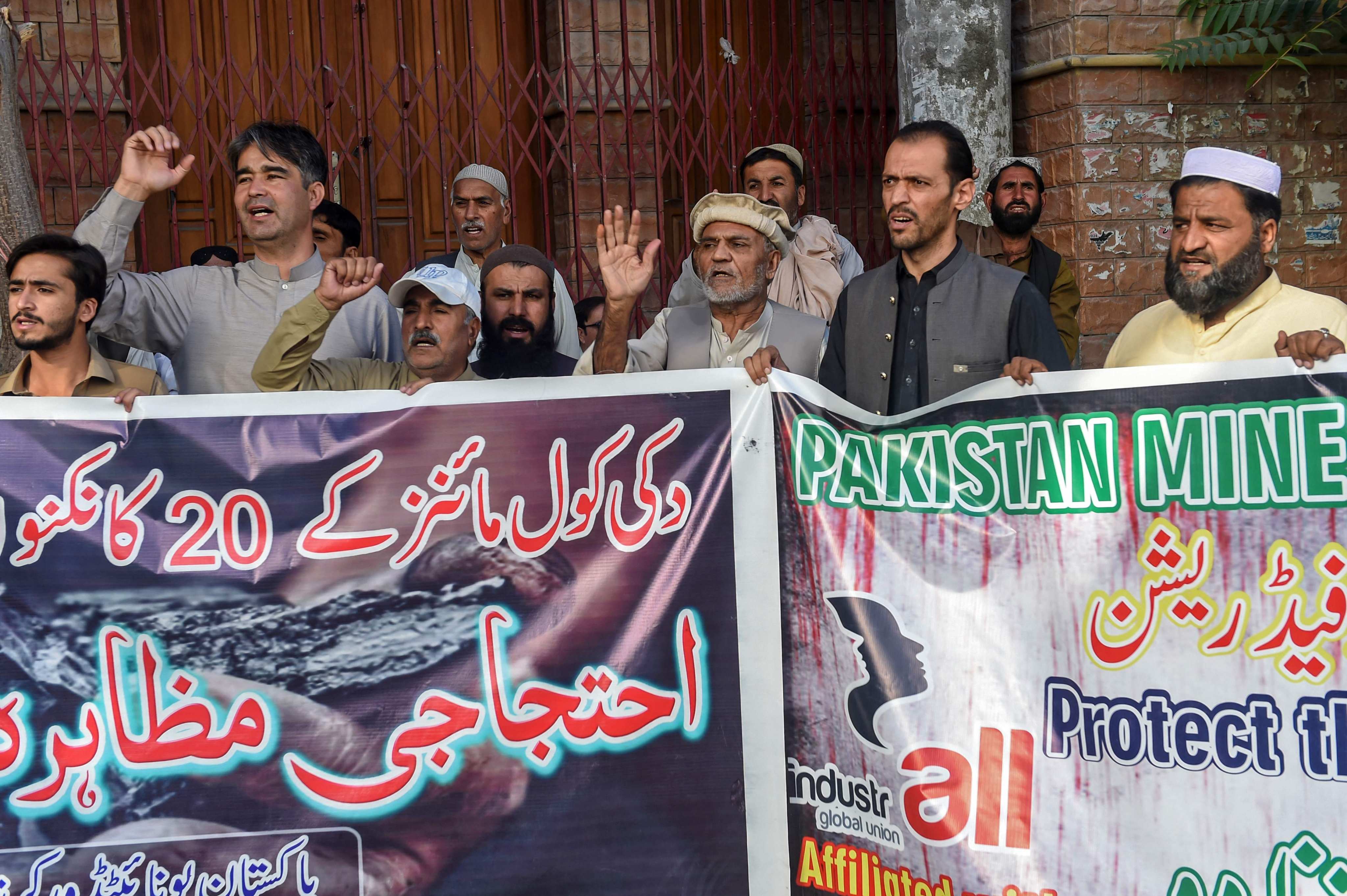 Members of the Pakistan Mine Workers Federation shout slogans during a protest against the killings of coal miners in Balochistan’s Duki district, in Quetta on Friday. Photo: AFP