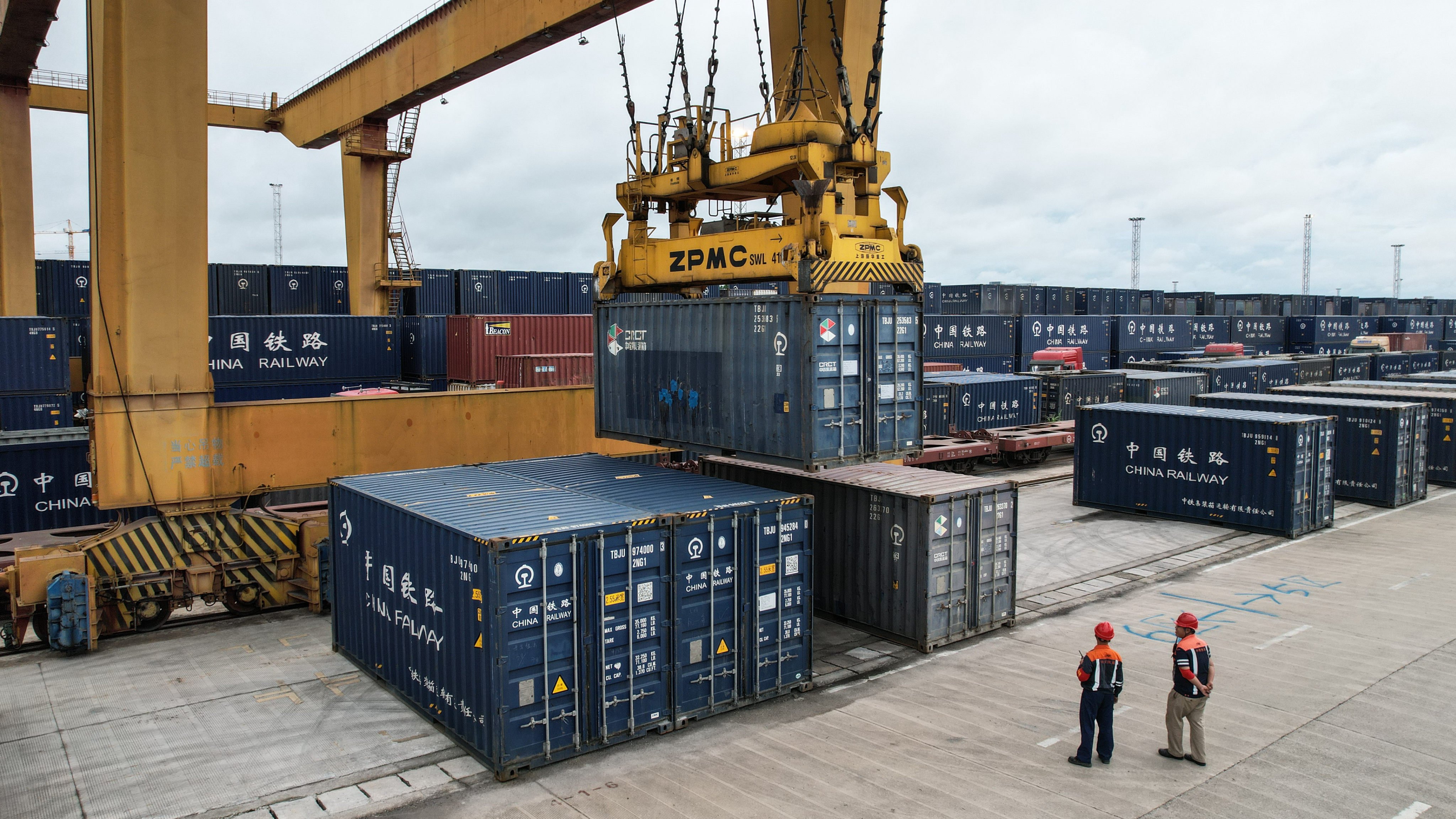 Staff members watch over the loading of containers at Nanning International Railway Port in Nanning, south China’s Guangxi Zhuang autonomous region. Photo: Xinhua