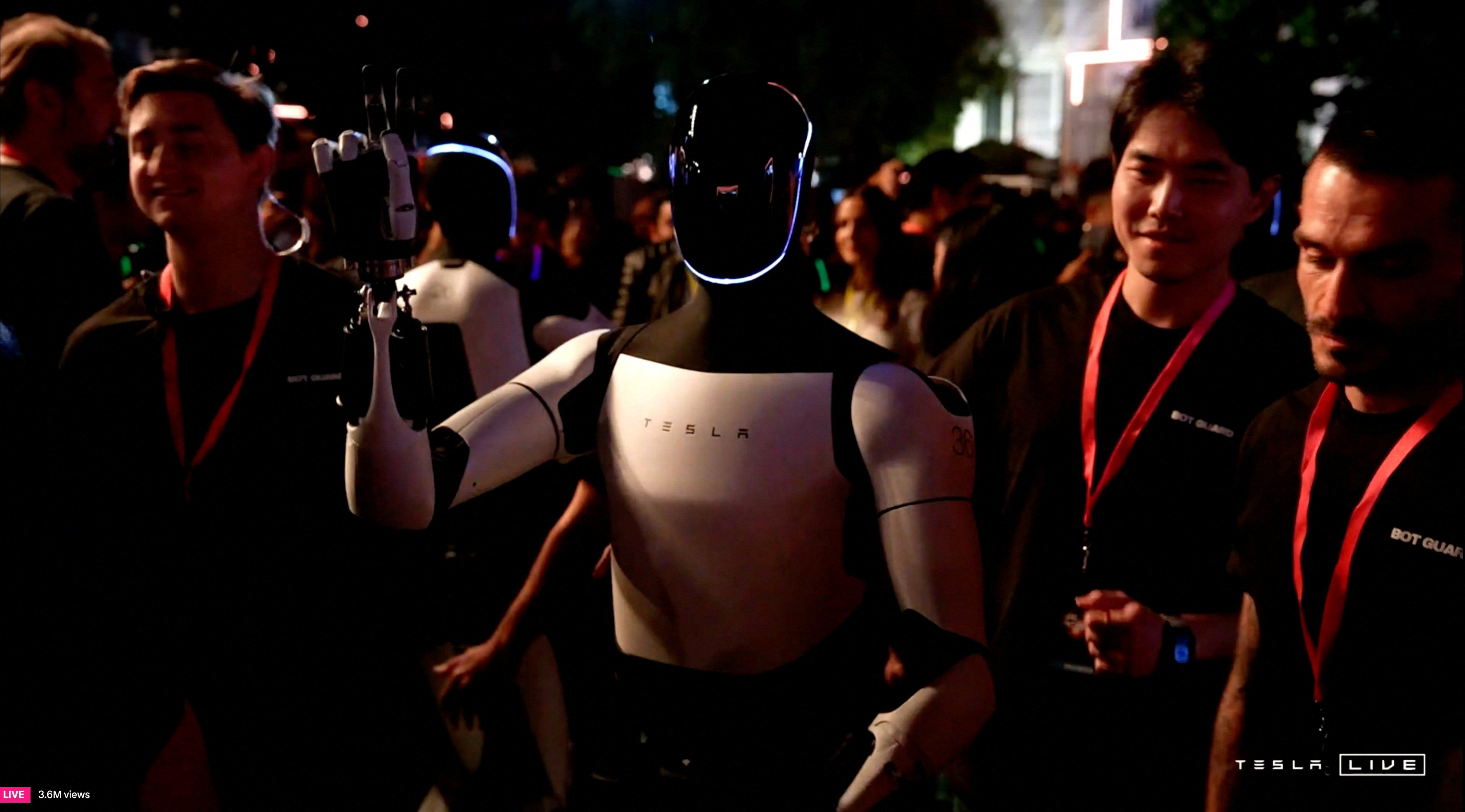 Tesla’s Optimus robot gestures at an unveiling event in Los Angeles, California last week. Photo: Handout via Reuters