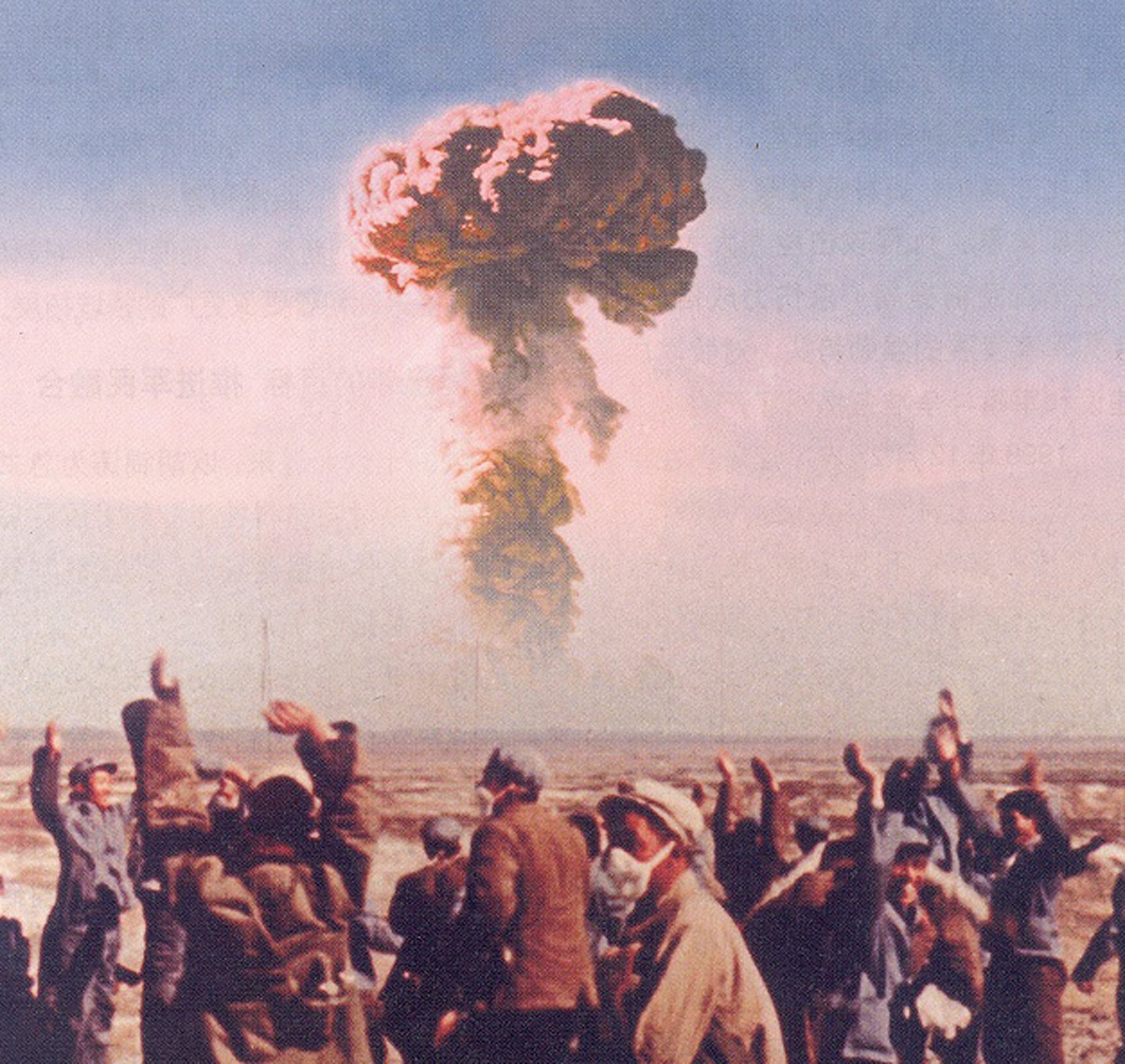 An undated file photo shows people celebrating the successful test of an atomic bomb in China. Photo: Handout