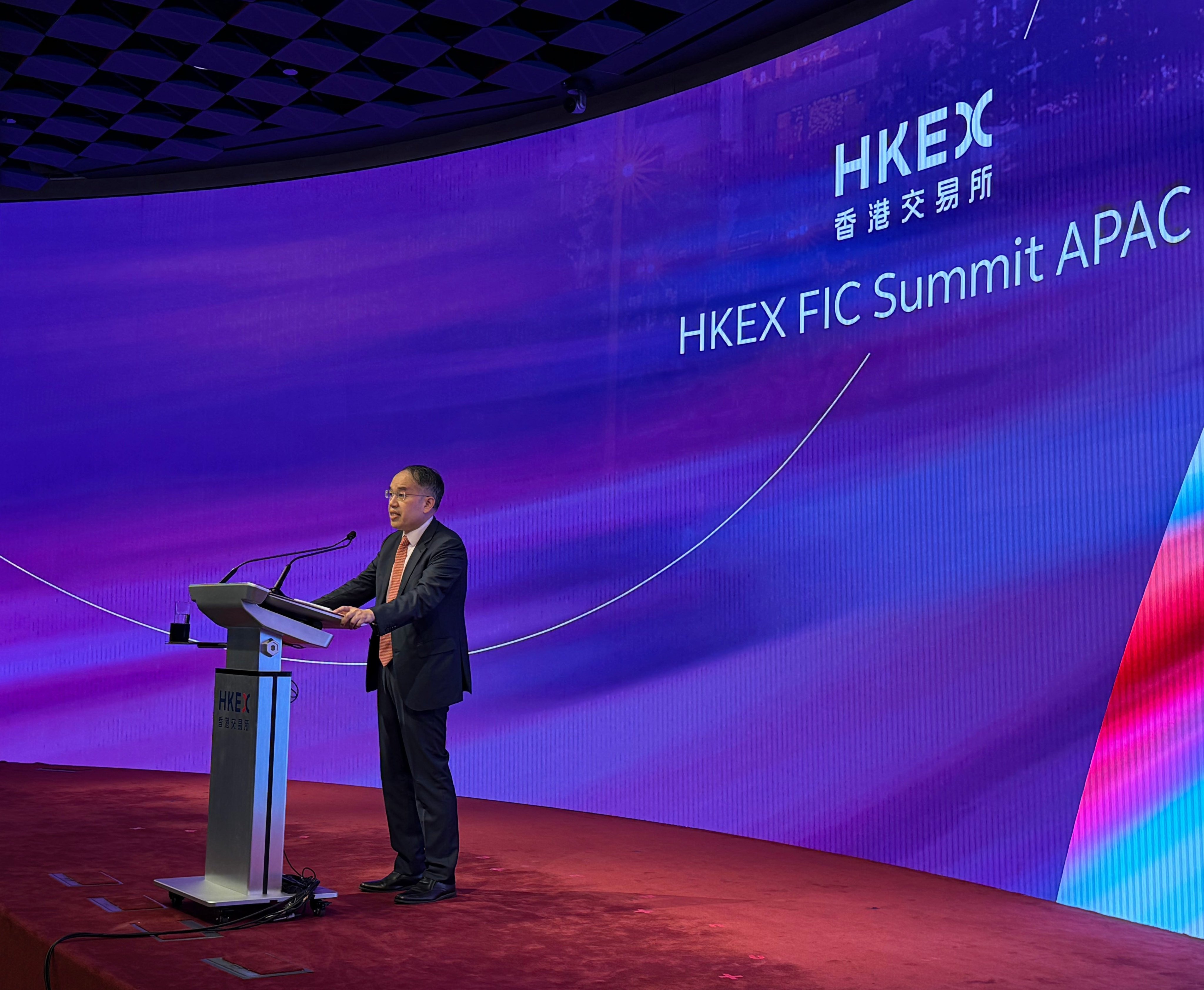 Hong Kong can attract inflows, given its role as a conduit for yuan transactions, Hui says at a HKEX summit in Central on October 15. Photo: SCMP 