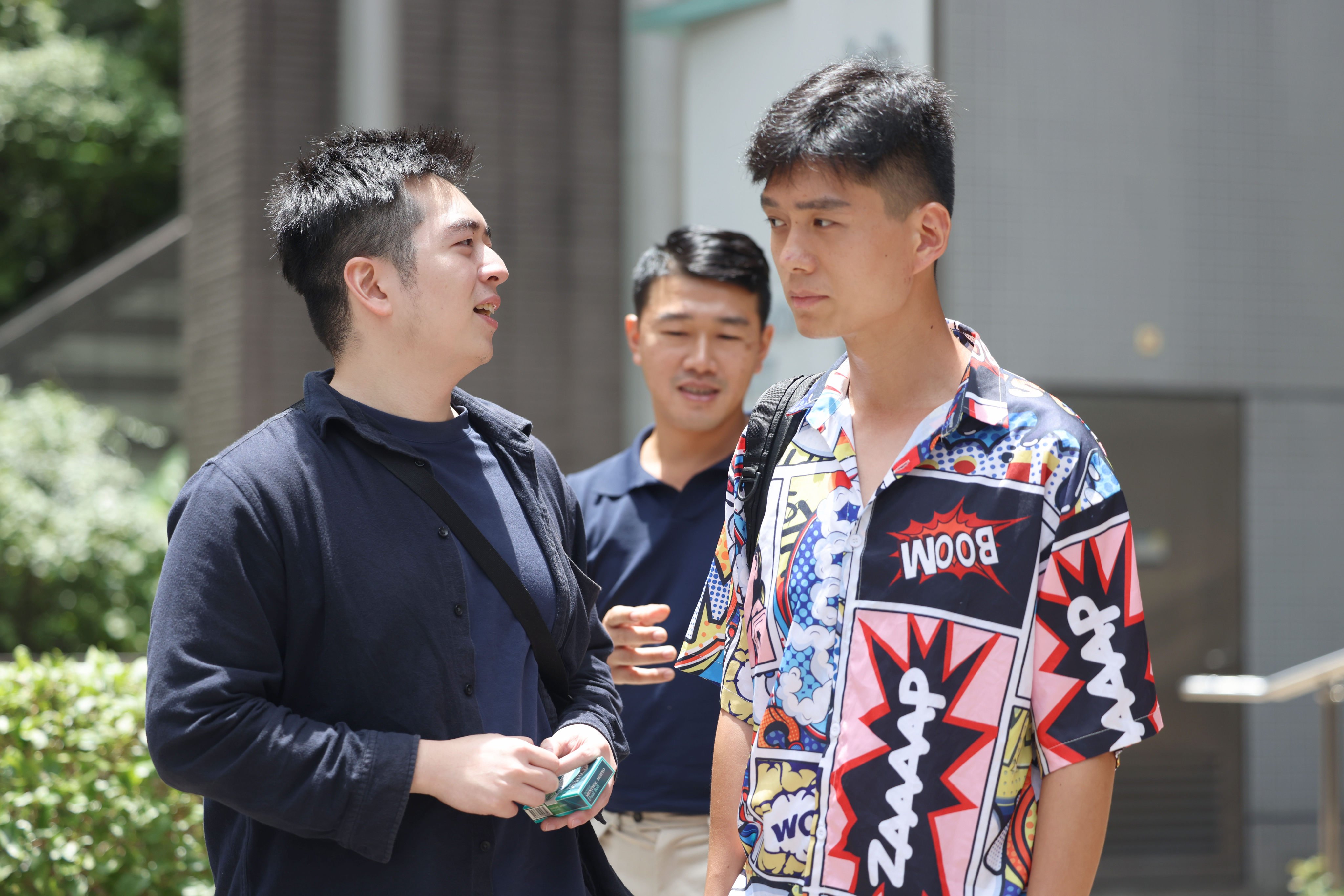 (From left) Tsang Wai-shing, Yuen Tsz-kin and Ip Ka-kin at Kowloon City Court in August. The trio have been convicted of assault after soaking policemen with water guns at the Songkran Festival in 2023. Photo: Brian Wong