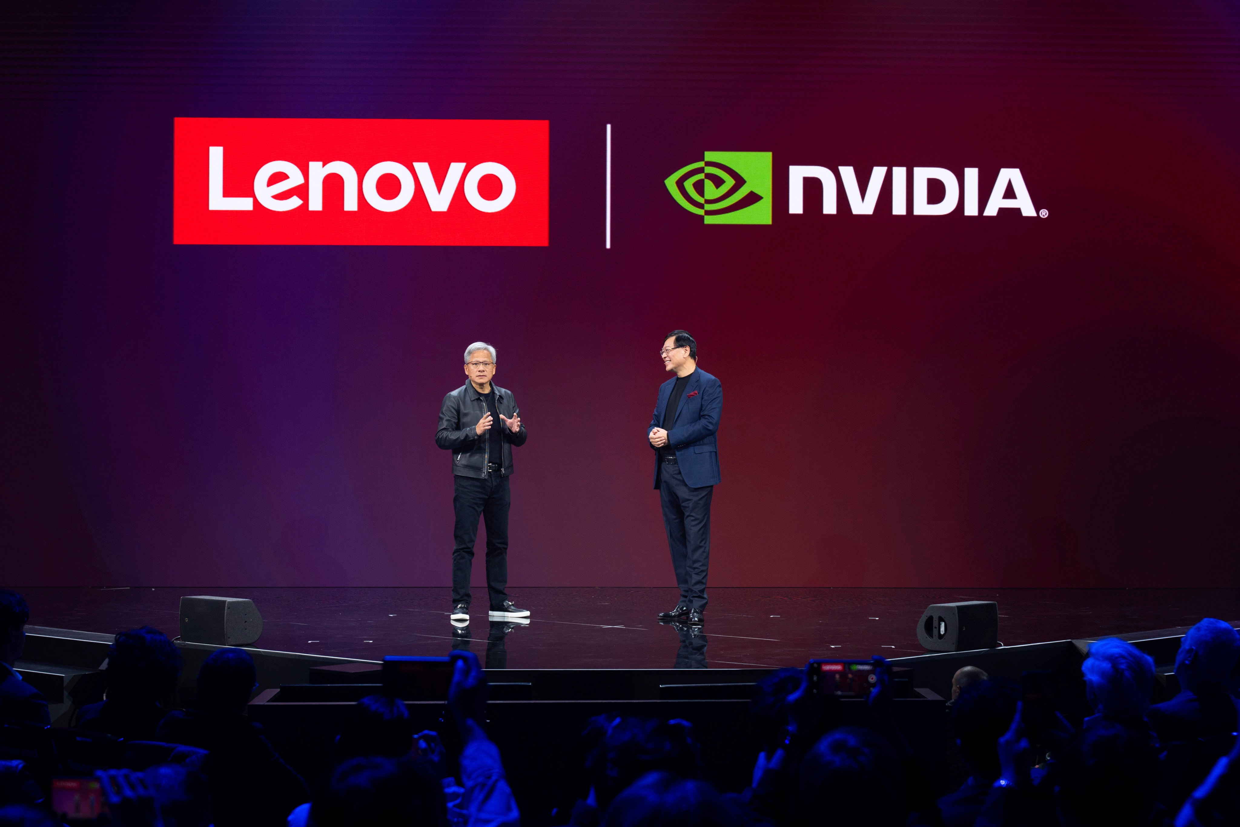 Lenovo CEO Yuanqing Yang (right) with Nvidia CEO Jensen Huang, at the Lenovo Tech World event in Seattle, Oct.15, 2024. Photo: Lenovo via AP