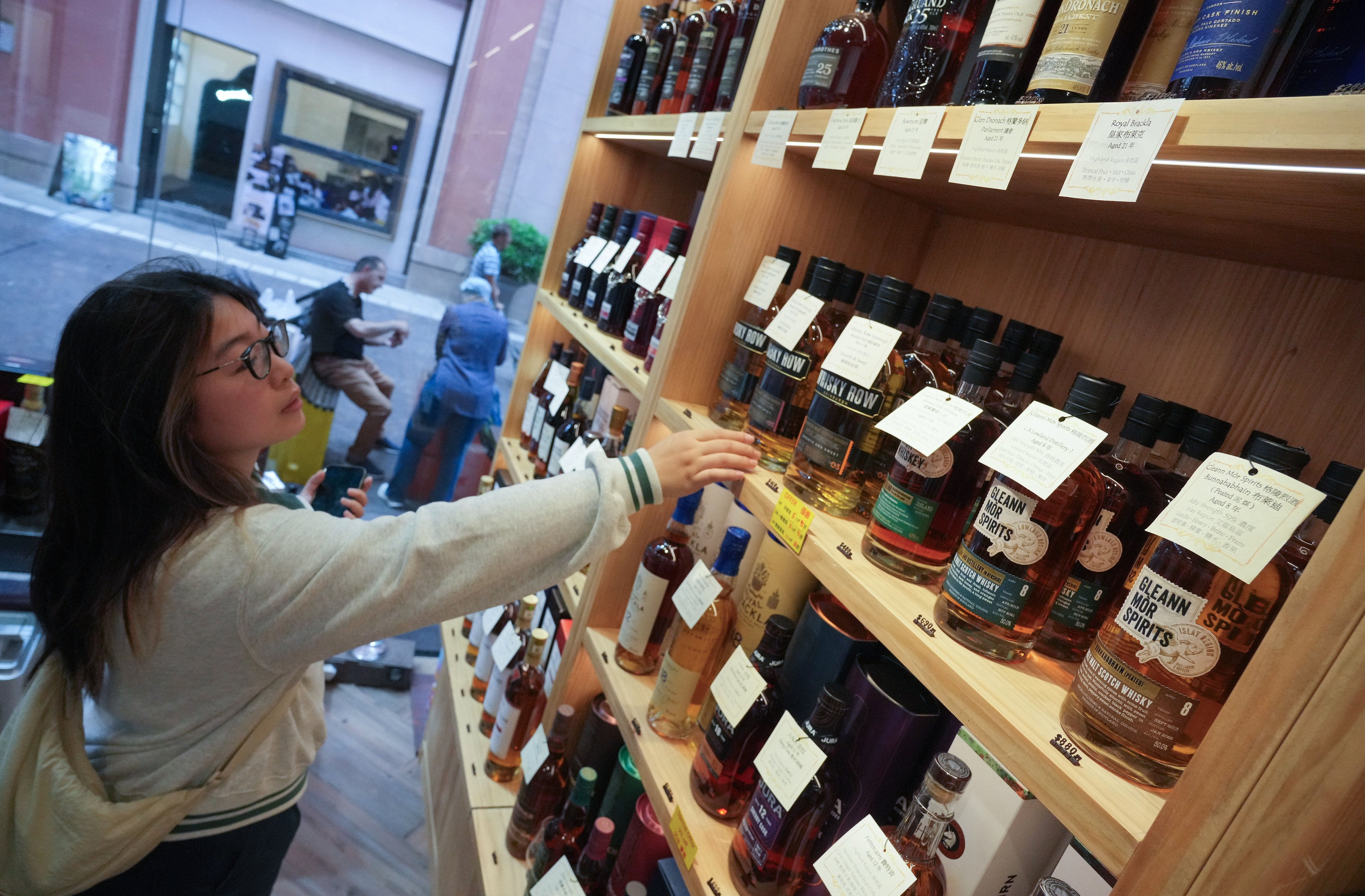 Consumers of high-end spirits are generally pleased about the tax cut on high-end spirits, but the response from liquor traders has been mixed. Photo: May Tse