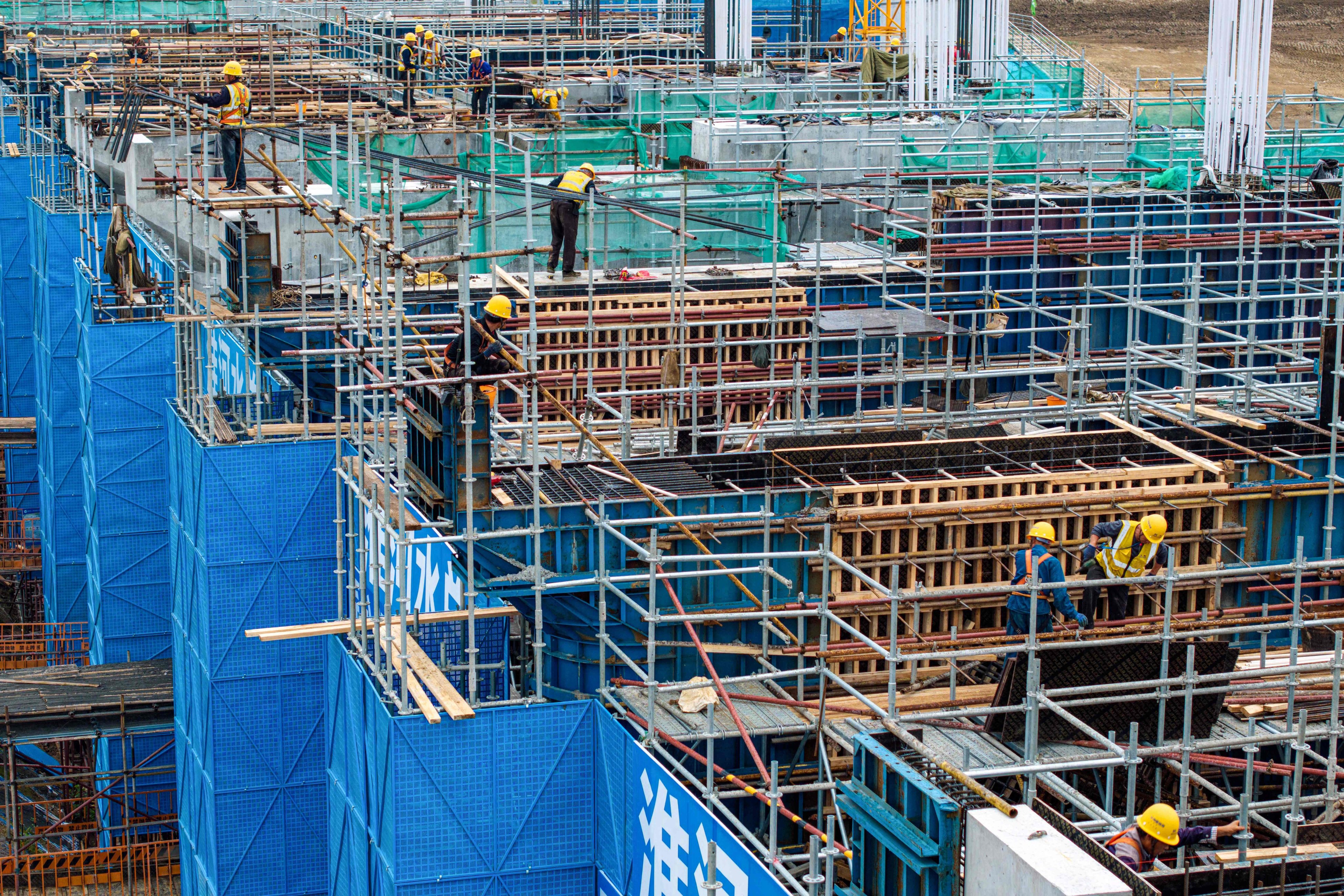 Workers at a construction site in Huaian, in eastern China’s Jiangsu province. Photo: AFP