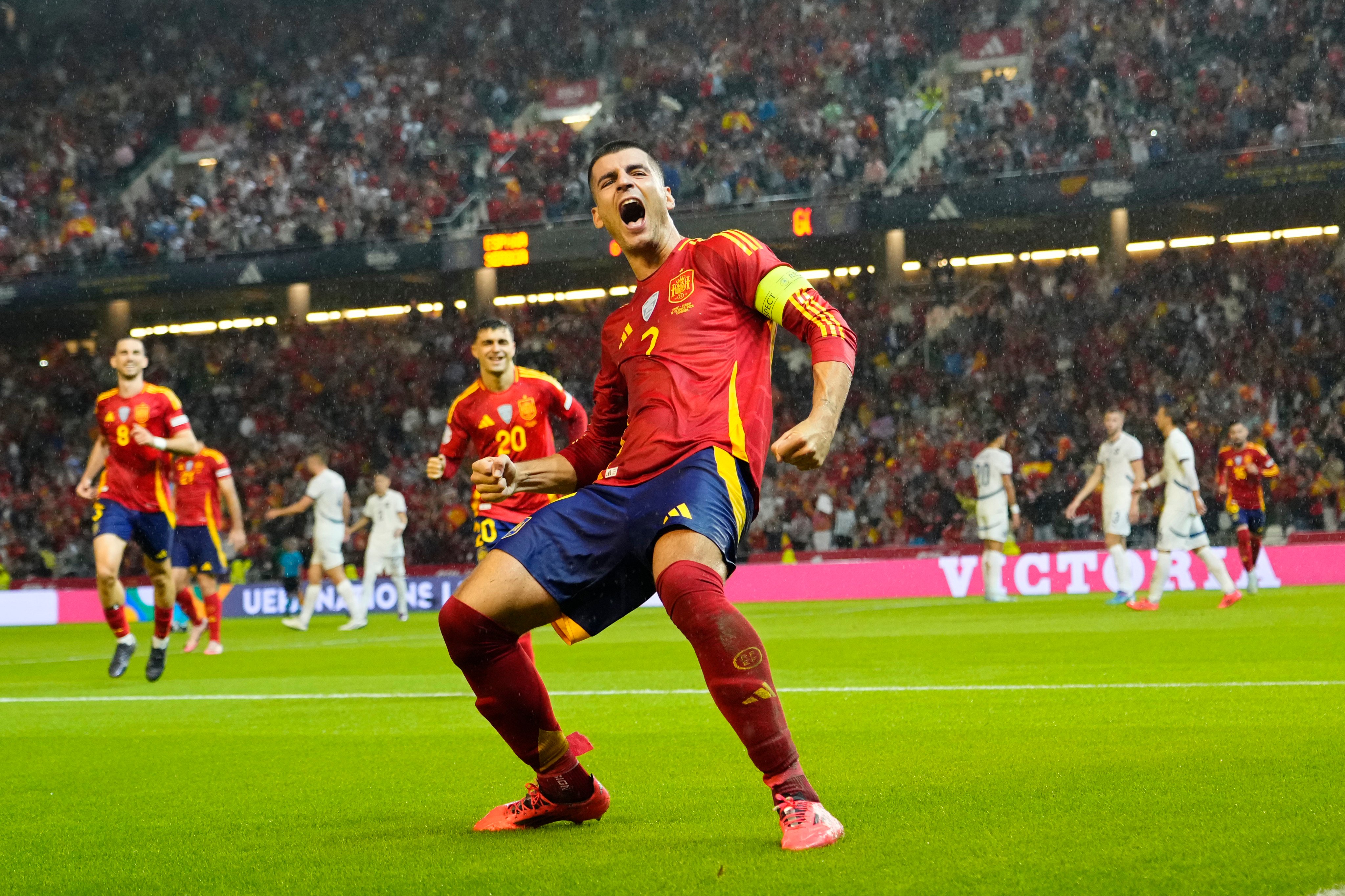 Spain’s Alvaro Morata celebrates after scoring his side’s second goal against Serbia at the Nuevo El Arcangel Stadium in Cordoba. Photo: AP