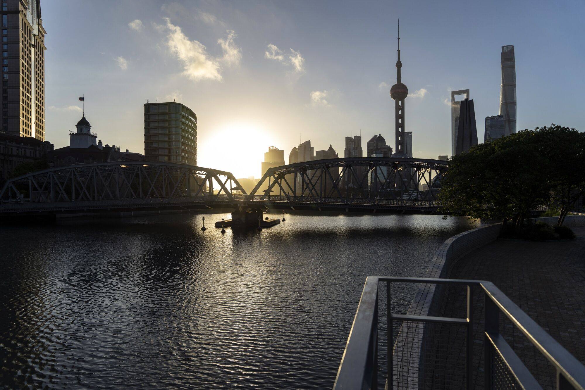 A proposed law to boost private sector confidence in the economy should include measures to elevate the legal status of private firms, which were a “source of vitality”, says economist Teng Tai. Photo: Bloomberg