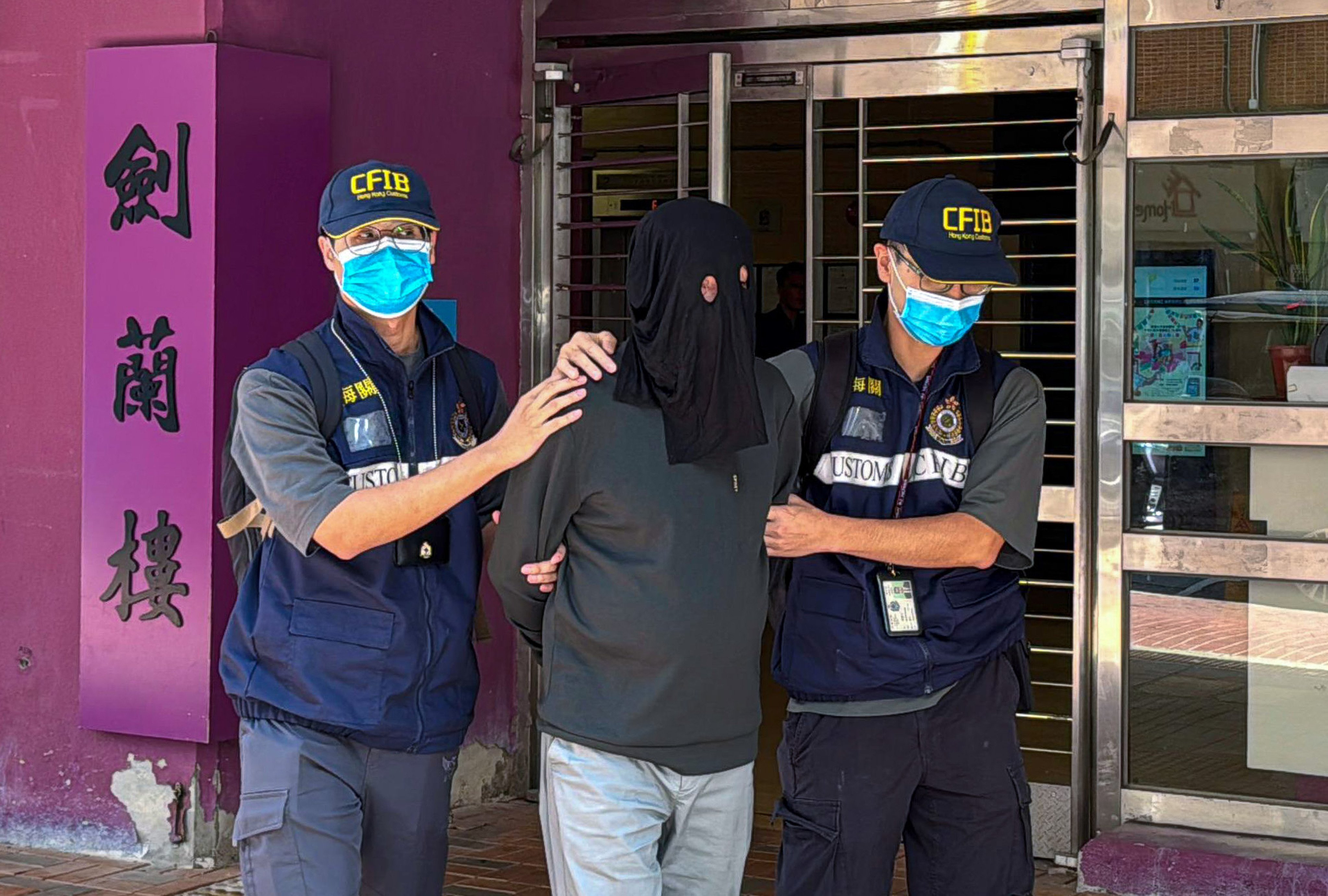 A bank manager is among five men arrested by Hong Kong customs in a crackdown on a local money-laundering syndicate. Photo: Handout