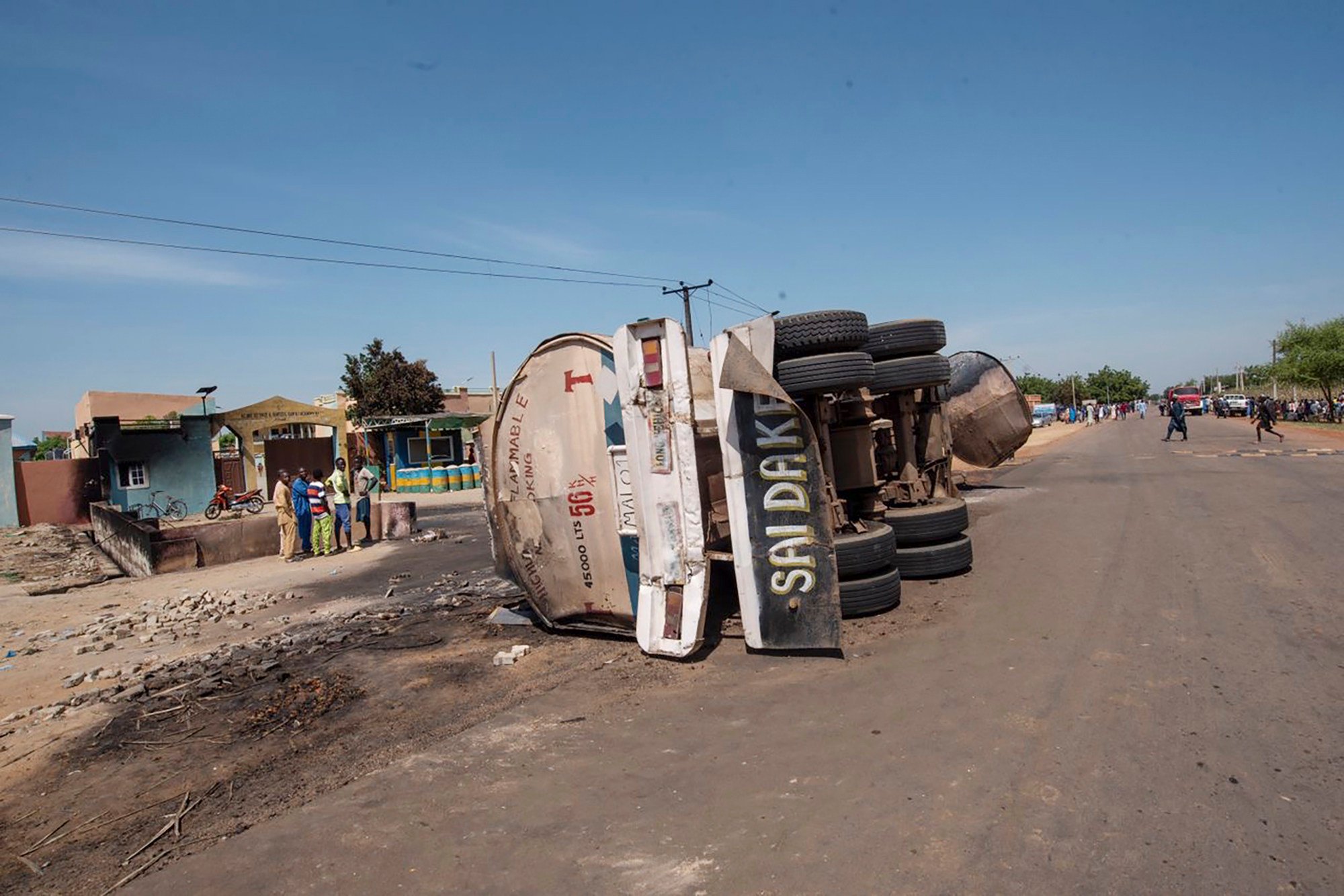 People gather at the scene of a tanker explosion in Majiya town. Deadly tanker accidents are common in Nigeria, Africa’s most populous country, where traffic regulations are not strictly enforced. Photo: AP